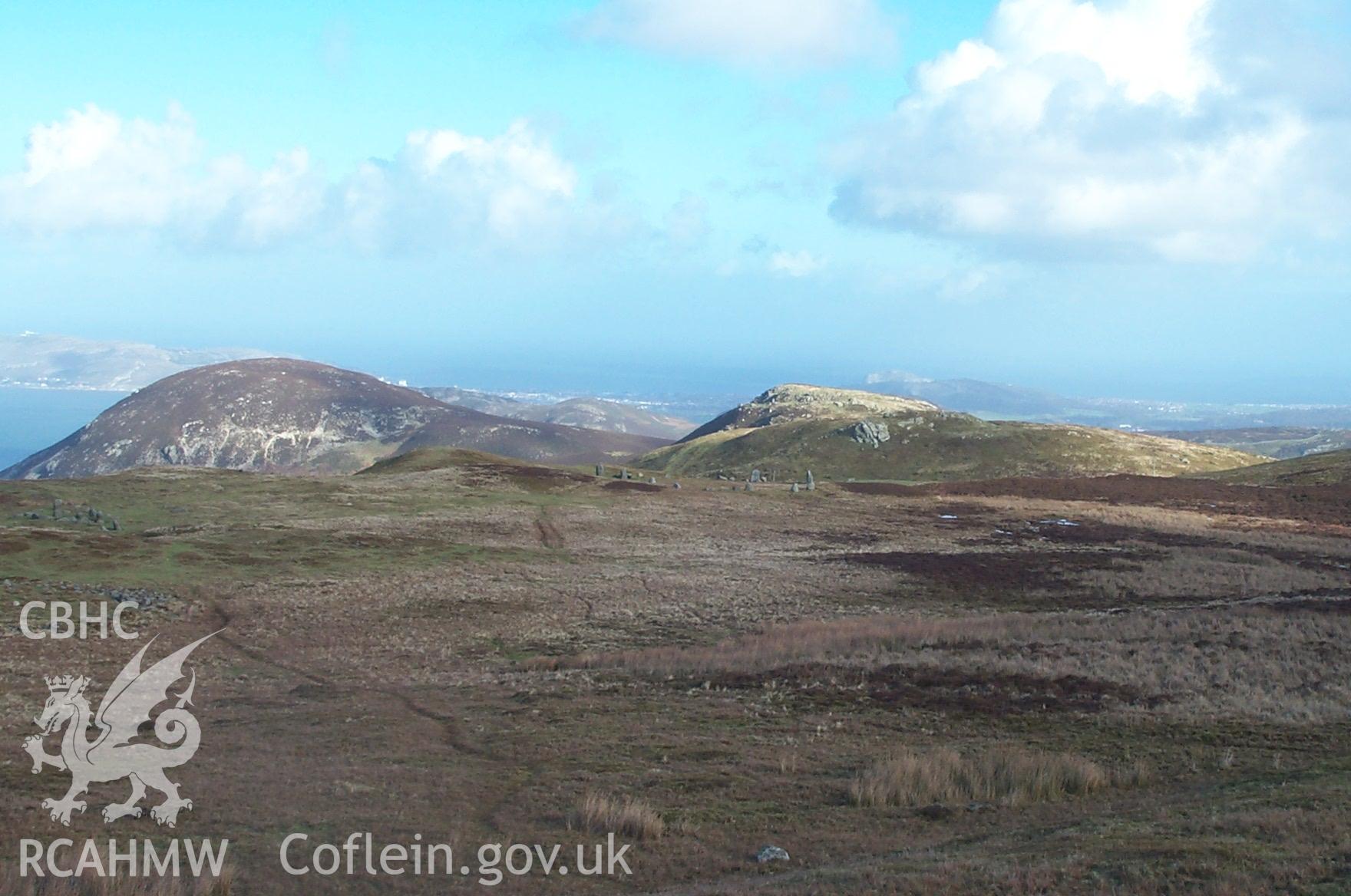 Digital photograph of Penmaenmawr Stone Circle with sites 300889 and 300946 from the North-east. Taken by P. Schofield on 03/03/2004 during the Eastern Snowdonia (North) Upland Survey.