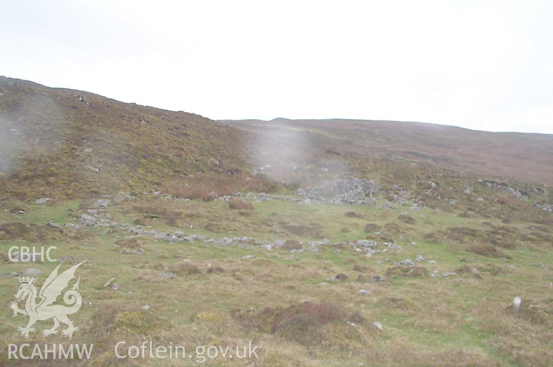 Digital photograph of Maen Penddu Standing Stone from the North-east. Taken by P. Schofield on 30/03/2004 during the Eastern Snowdonia (North) Upland Survey.