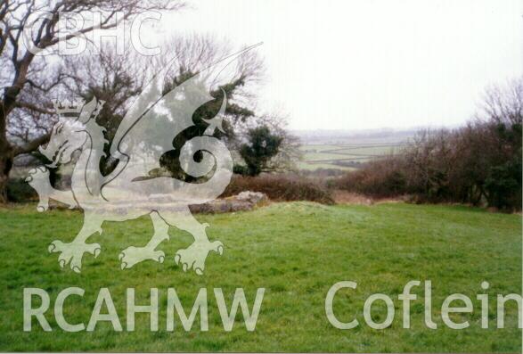 Digital colour photograph showing site 1015s (Highlight), looking north; the walls of the church are visible to the left, the excavated 'priest's house' lay on the ground dropping away in mid-right, now overgrown - used in the Glamorgan-Gwent Archaeological Trust Report on the deserted rural settlements of Glamorgan.