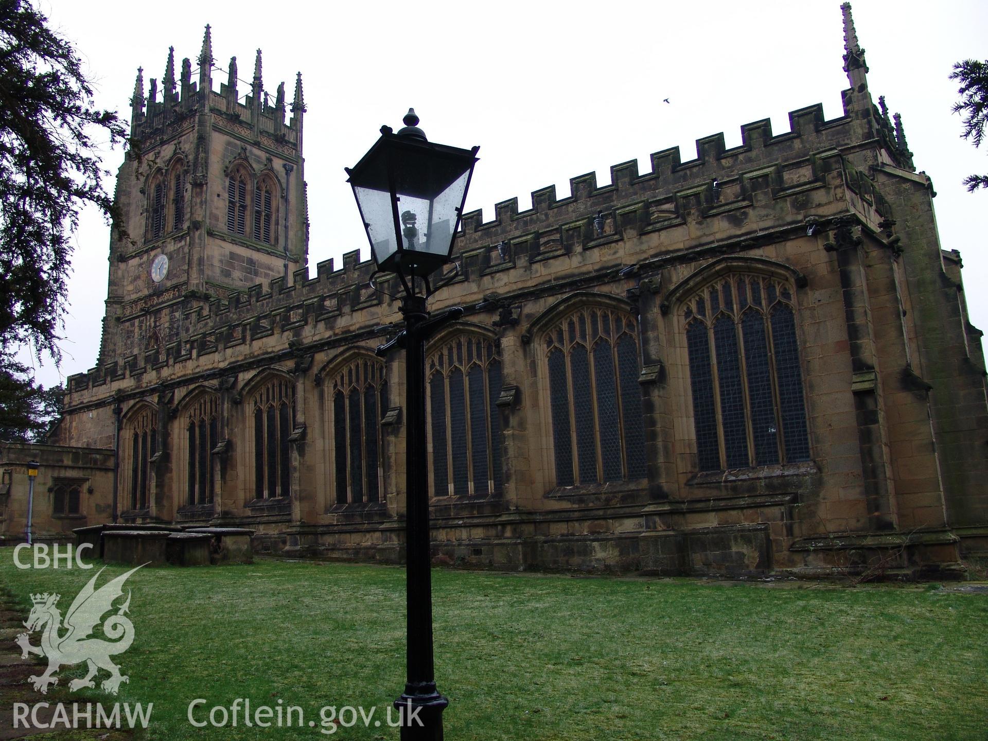 Digital colour photograph showing a three quarter elevation view of All Saints Church, Gresford.