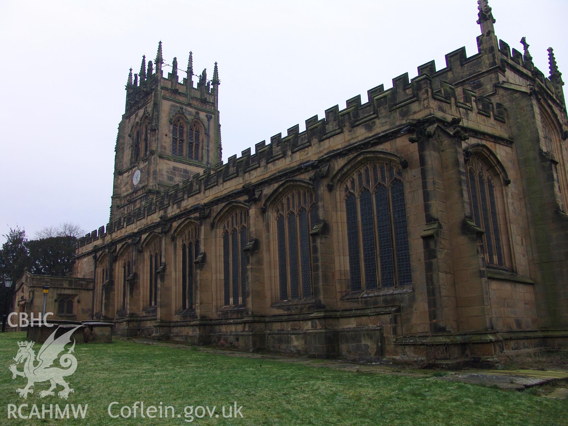 Digital colour photograph showing a three quarter elevation view of All Saints Church, Gresford.