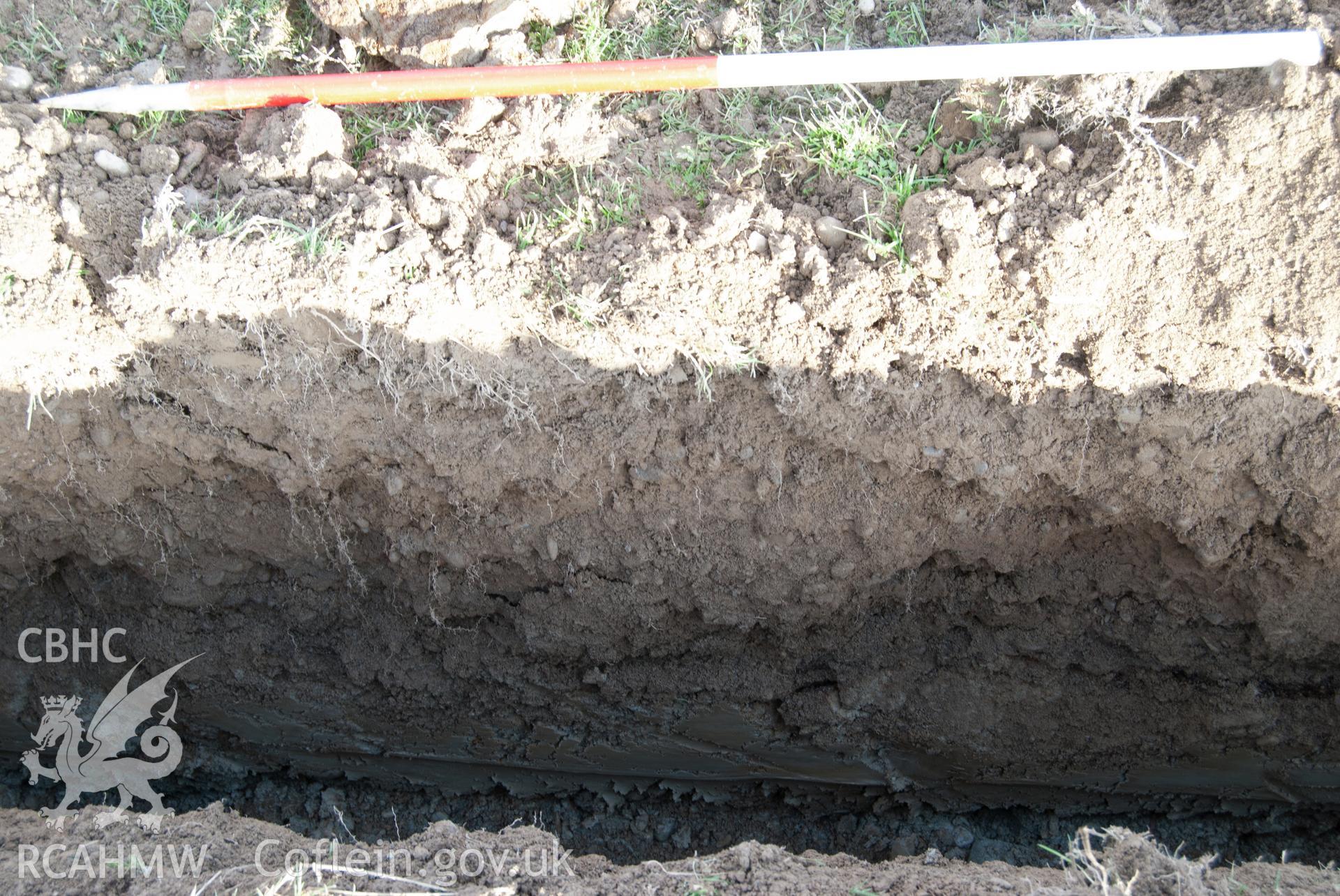 View from west showing east facing section of trench showing stratigraphy