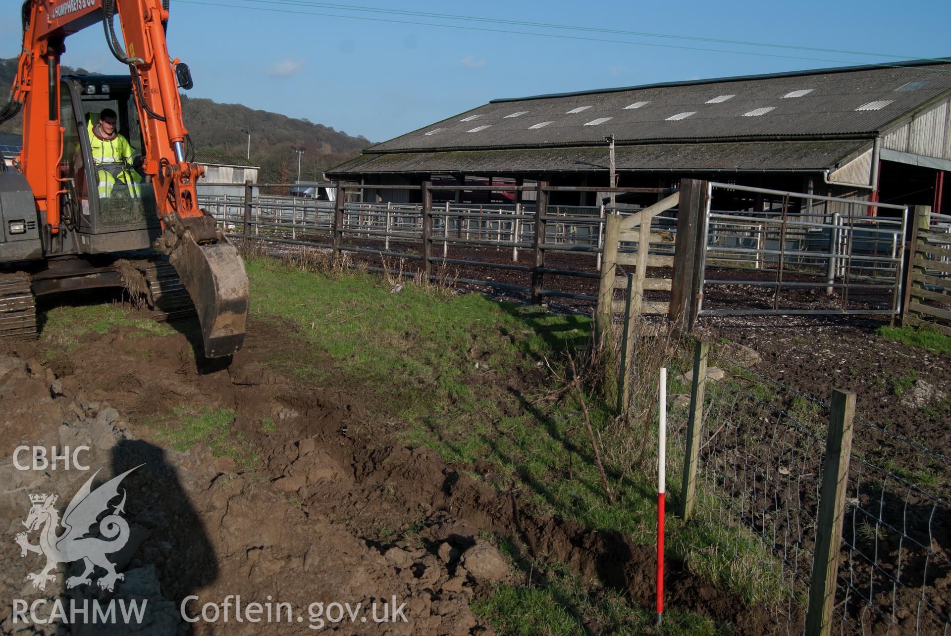 View from south showing working shot of trench by second transformer during excavation