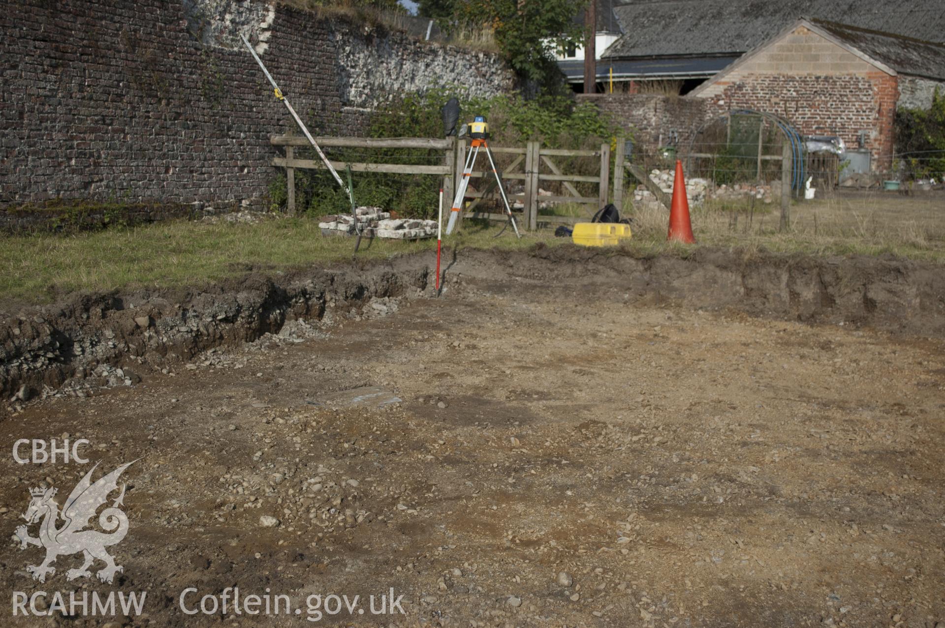 View from south-east showing north-west corner of the tennis court stripped.