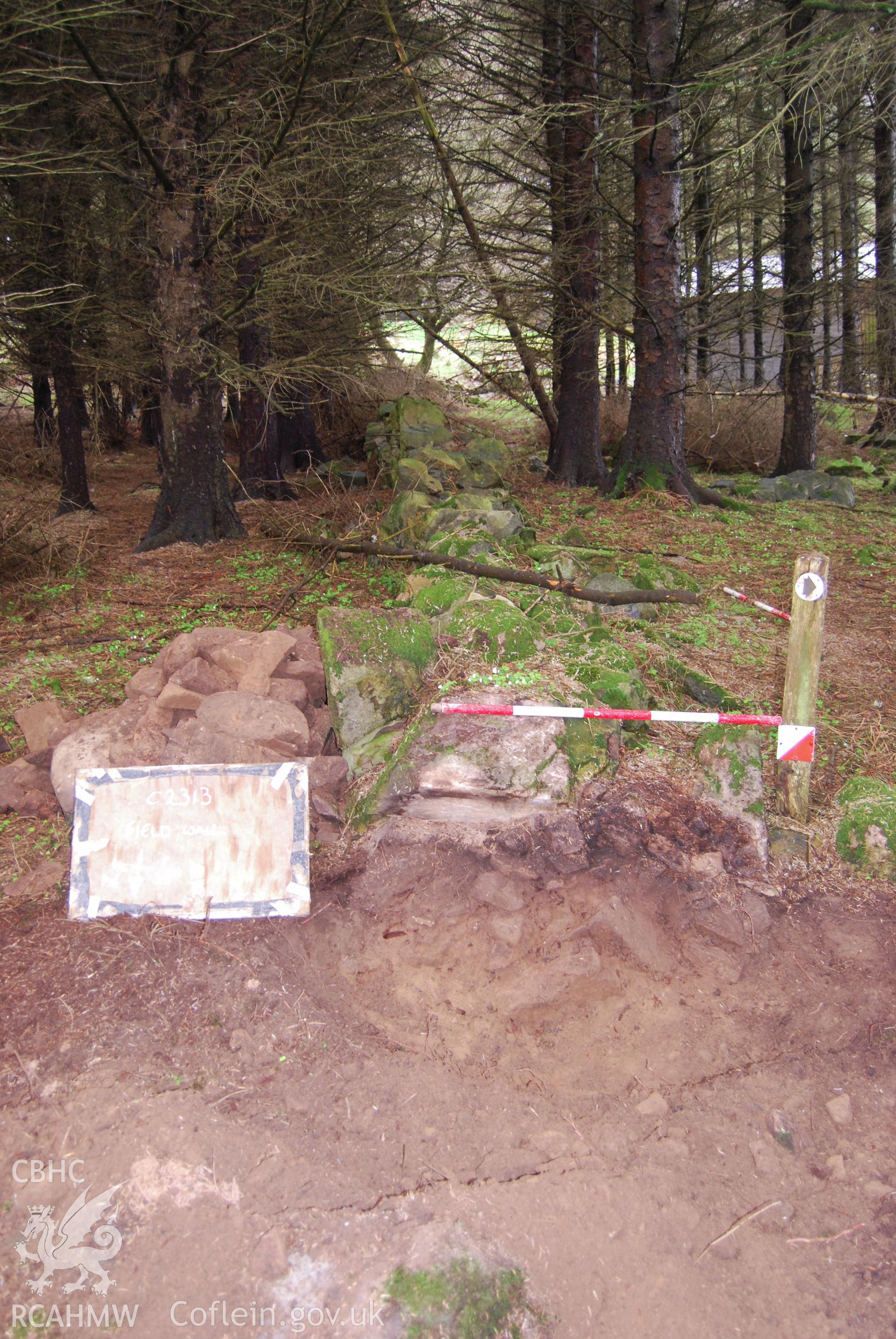 Photo showing 'Post-ex section of wall' from Archaeological Watching Brief of Nant Gwrtheyrn Lower Car Park, Nant Gwrtheyrn, Gwynedd produced by Gwynedd Archaeological Trust in 2013, Project No. G2313, Report No.1208.