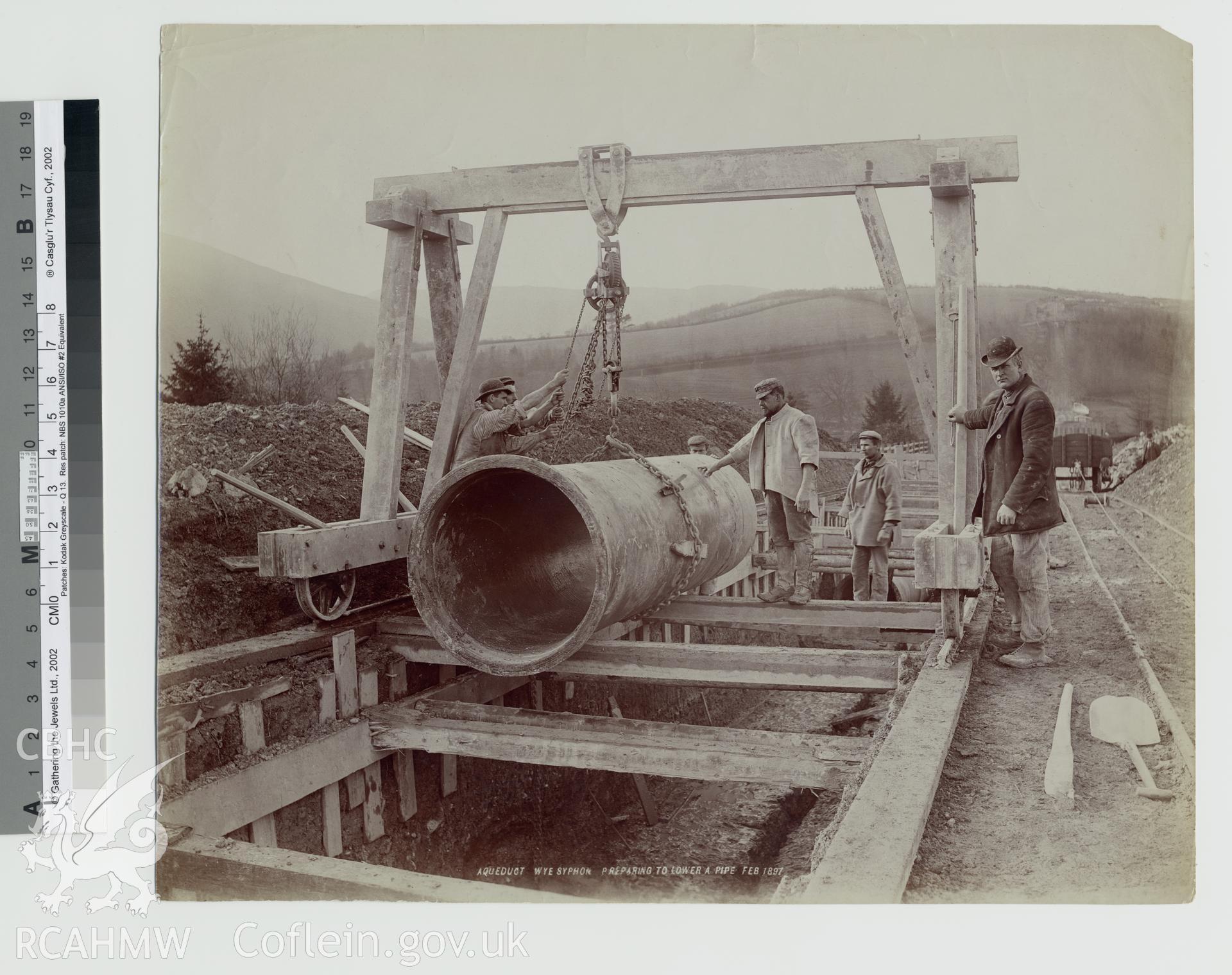 Black and white photograph of Wye Aqueduct showing syphon preparing to lower. Copy negative held.