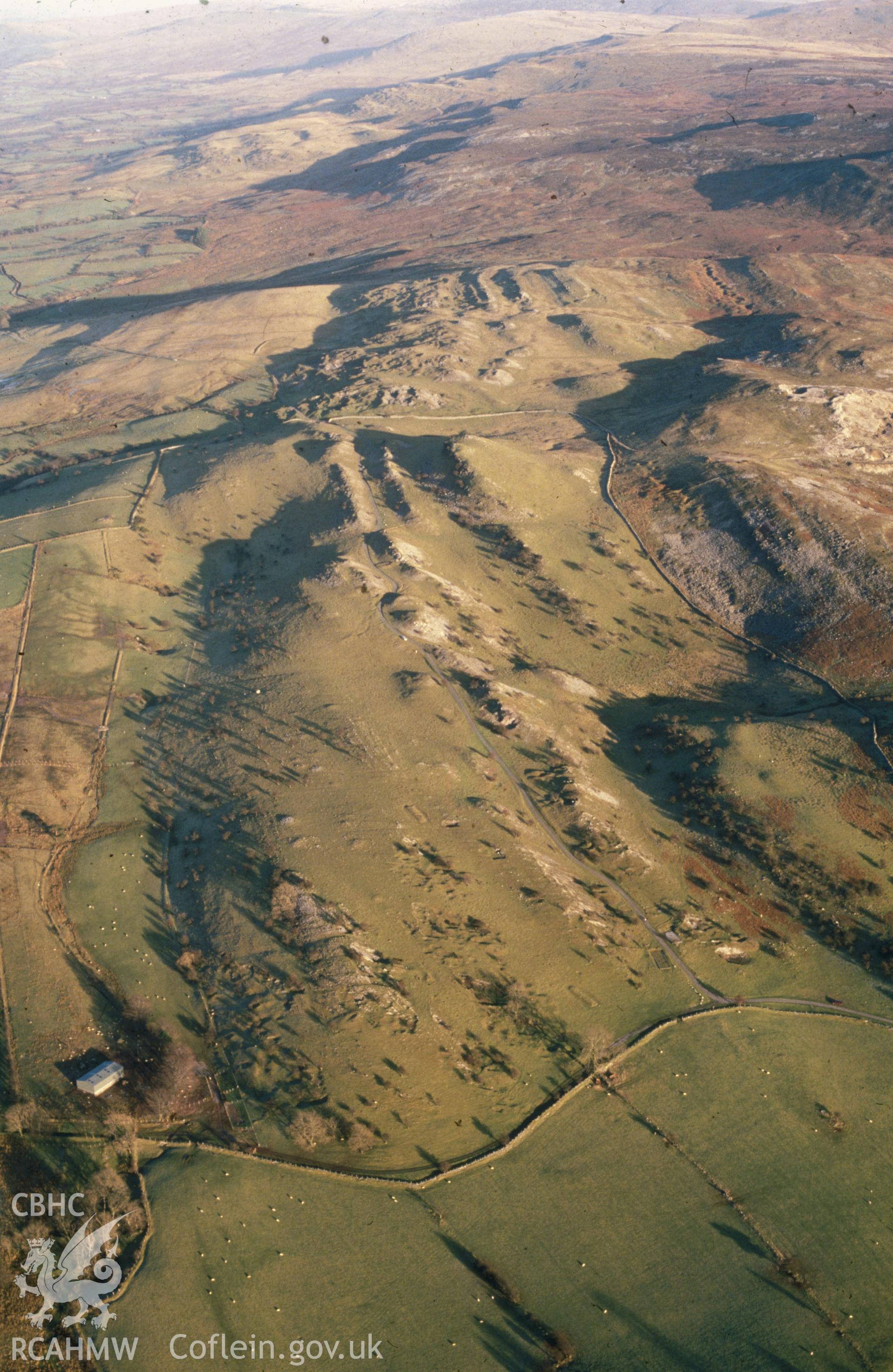 Slide of RCAHMW colour oblique aerial photograph of Beddau'r Derwyddon, Pillow Mounds, taken by C.R. Musson, 13/1/1991.