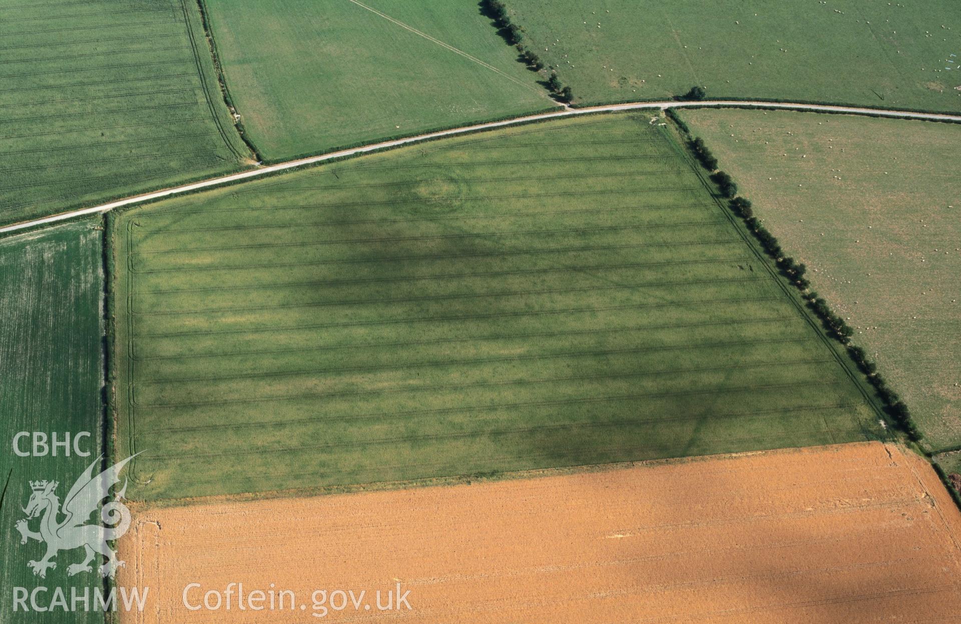 Slide of RCAHMW colour oblique aerial photograph of Hindwell Marching Camp, taken by C.R. Musson, 24/7/1996.