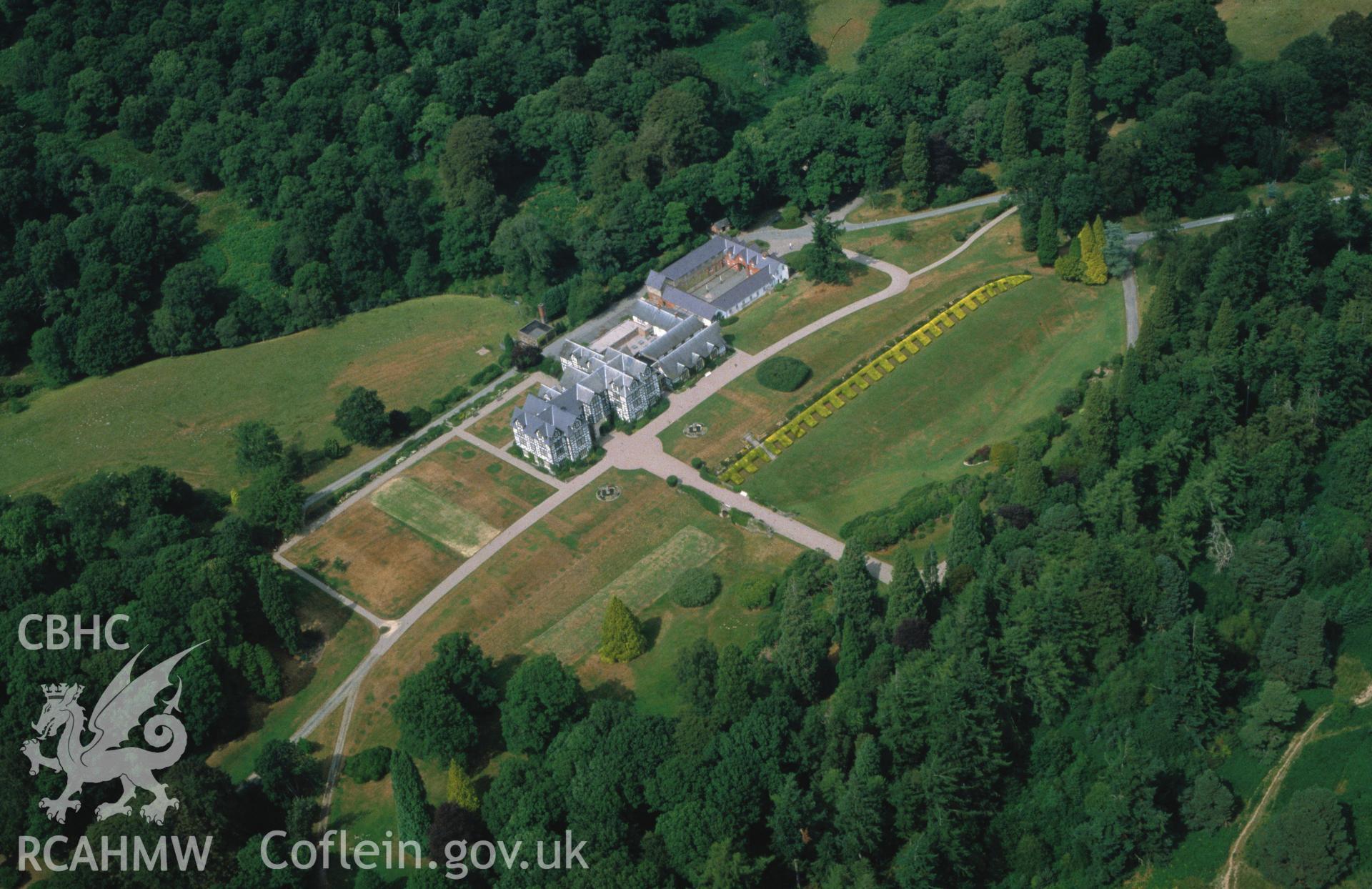 Slide of RCAHMW colour oblique aerial photograph of Gregynog Hall, taken by C.R. Musson, 29/7/1989.