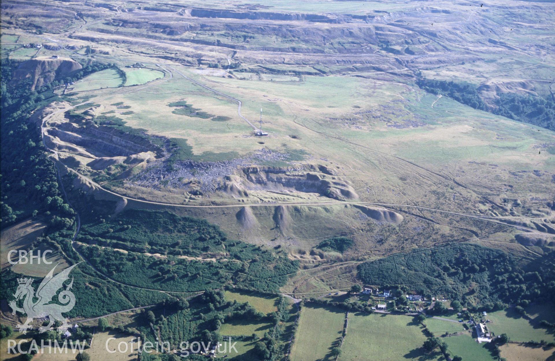 Slide of RCAHMW colour oblique aerial photograph of Tyla West Quarry, Gilwern Hill, Clydach, Blaenavon, taken by C.R. Musson, 7/8/1990.