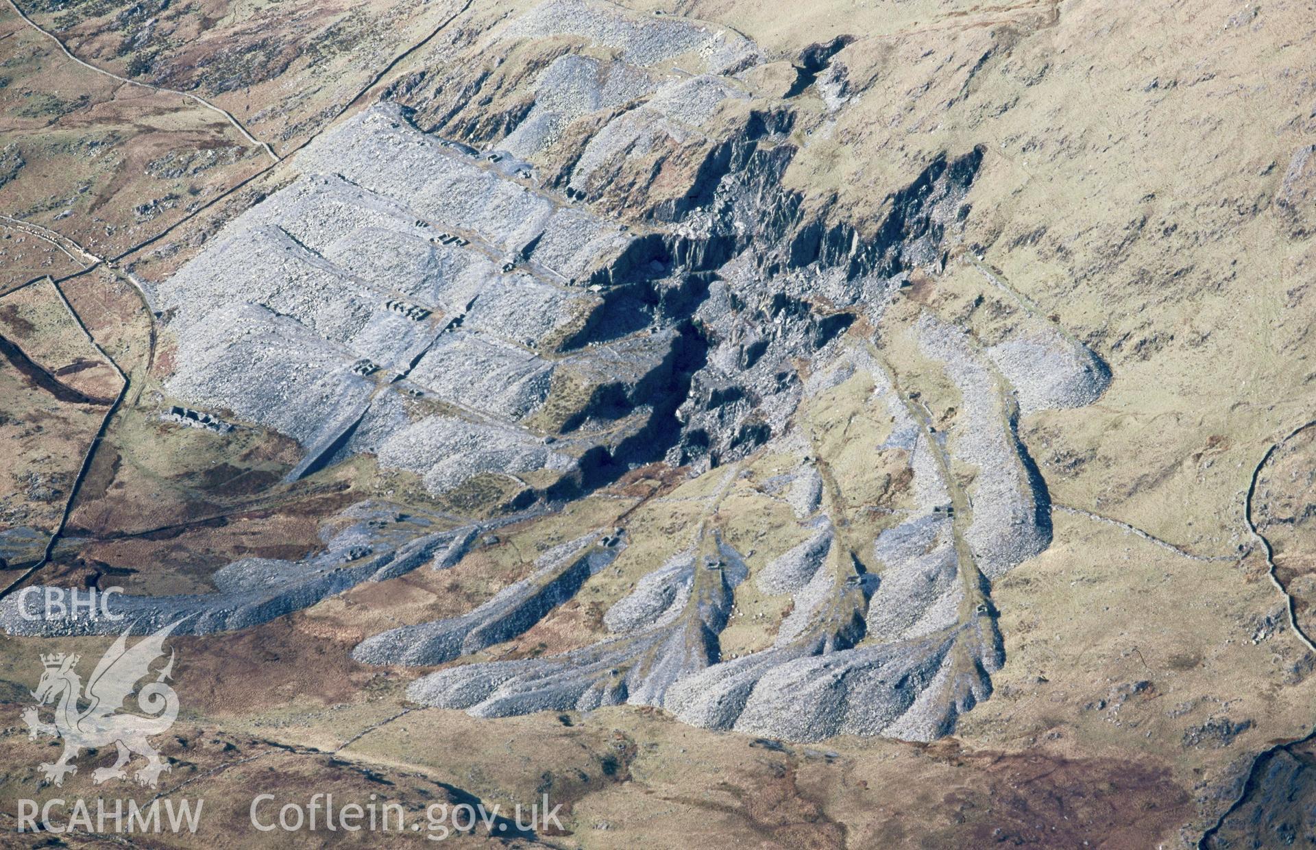 RCAHMW colour slide oblique aerial photograph of Gorseddau Slate Quarry, Dolbenmaen, taken by C.R.Musson on the 30/03/1996