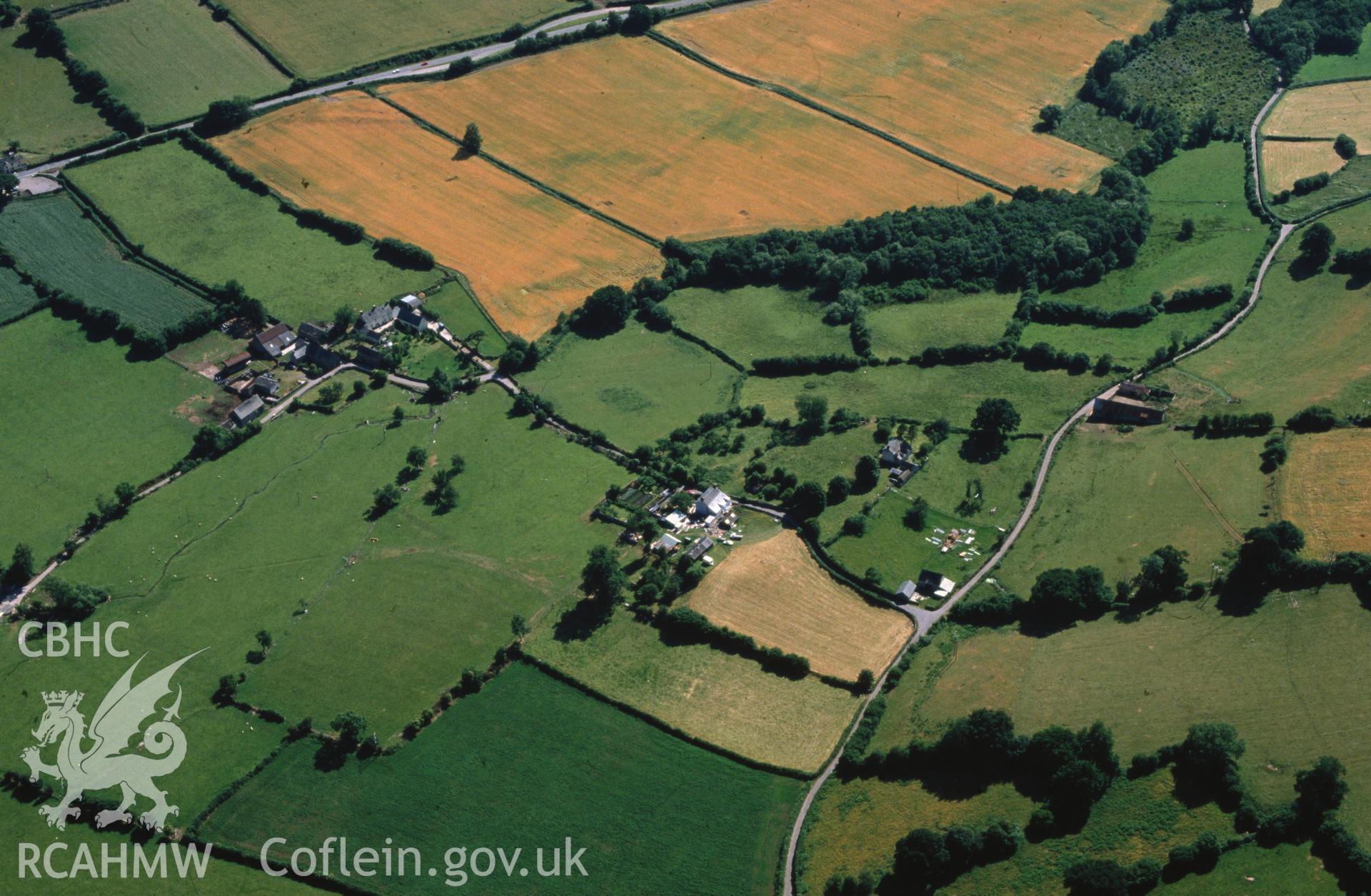 Slide of RCAHMW colour oblique aerial photograph of Pen Y Gaer Roman Fort, taken by C.R. Musson, 29/6/1989.