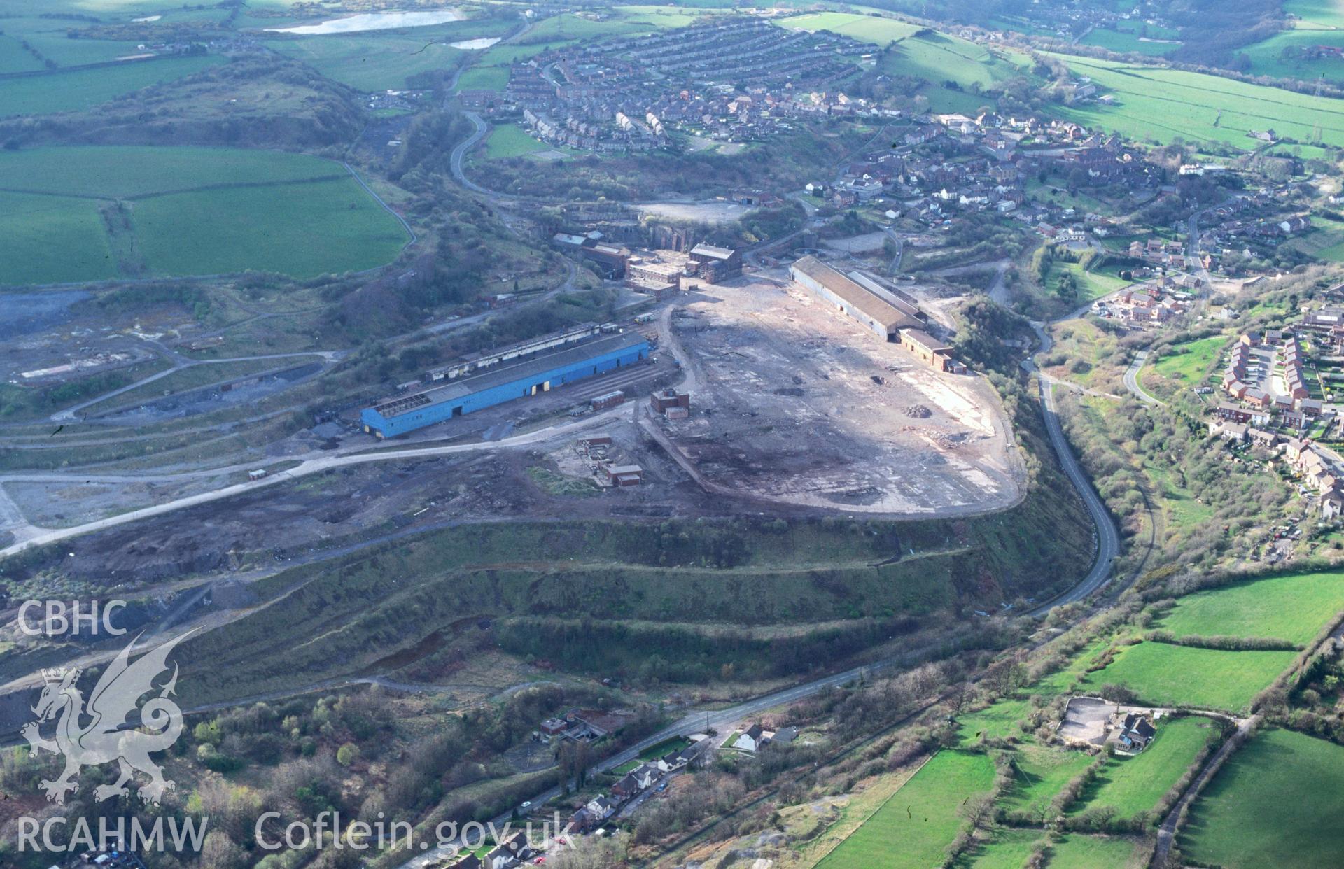 RCAHMW colour oblique aerial photograph of Brymbo Steelworks taken on 07/04/1995 by C.R. Musson