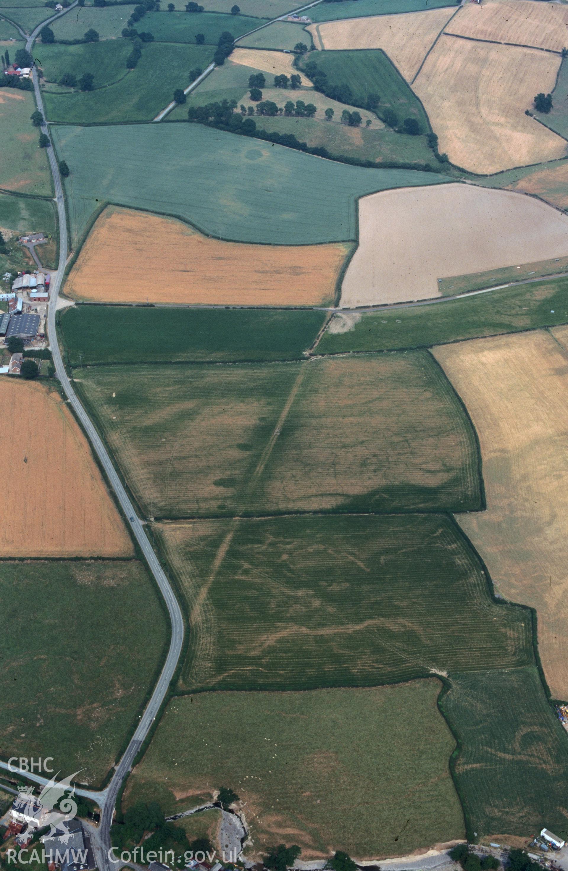 Slide of RCAHMW colour oblique aerial photograph of Roman Road,trefeglwys, taken by C.R. Musson, 9/7/1995.