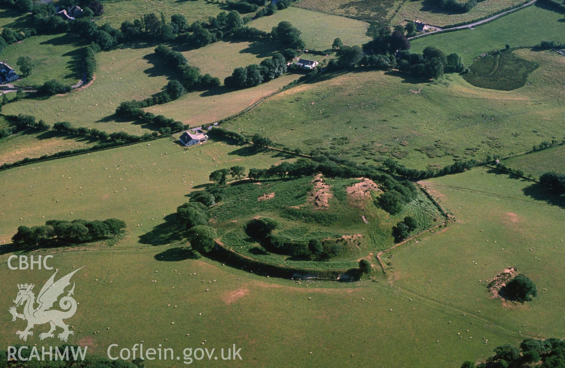 Slide of RCAHMW colour oblique aerial photograph of Sunnyhill Fort/castell Tregaron, taken by C.R. Musson, 24/6/1989.