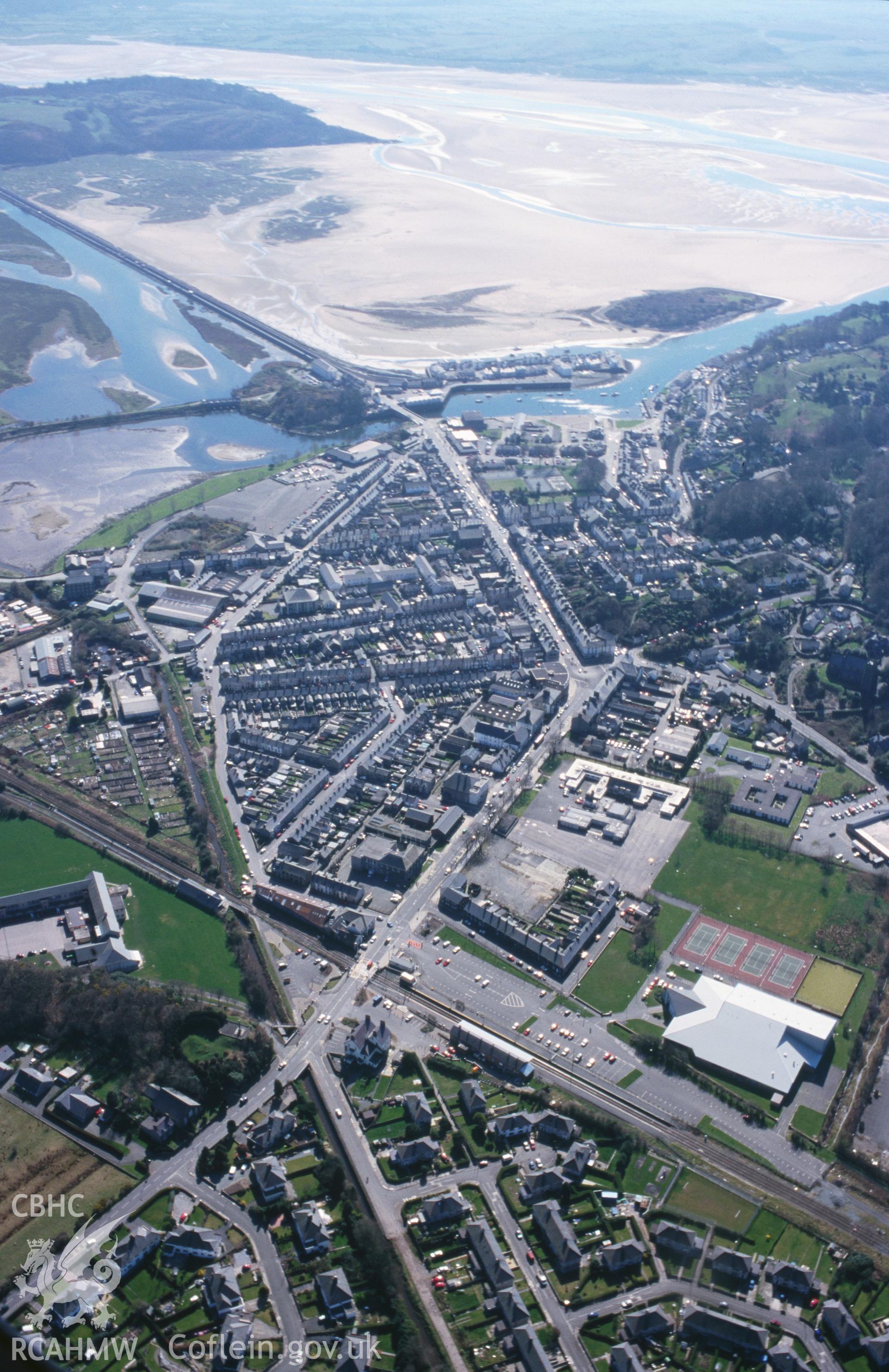 Slide of RCAHMW colour oblique aerial photograph of Porthmadog Harbour New Wharf;snowdon Wharf, taken by T.G. Driver, 30/3/2000.