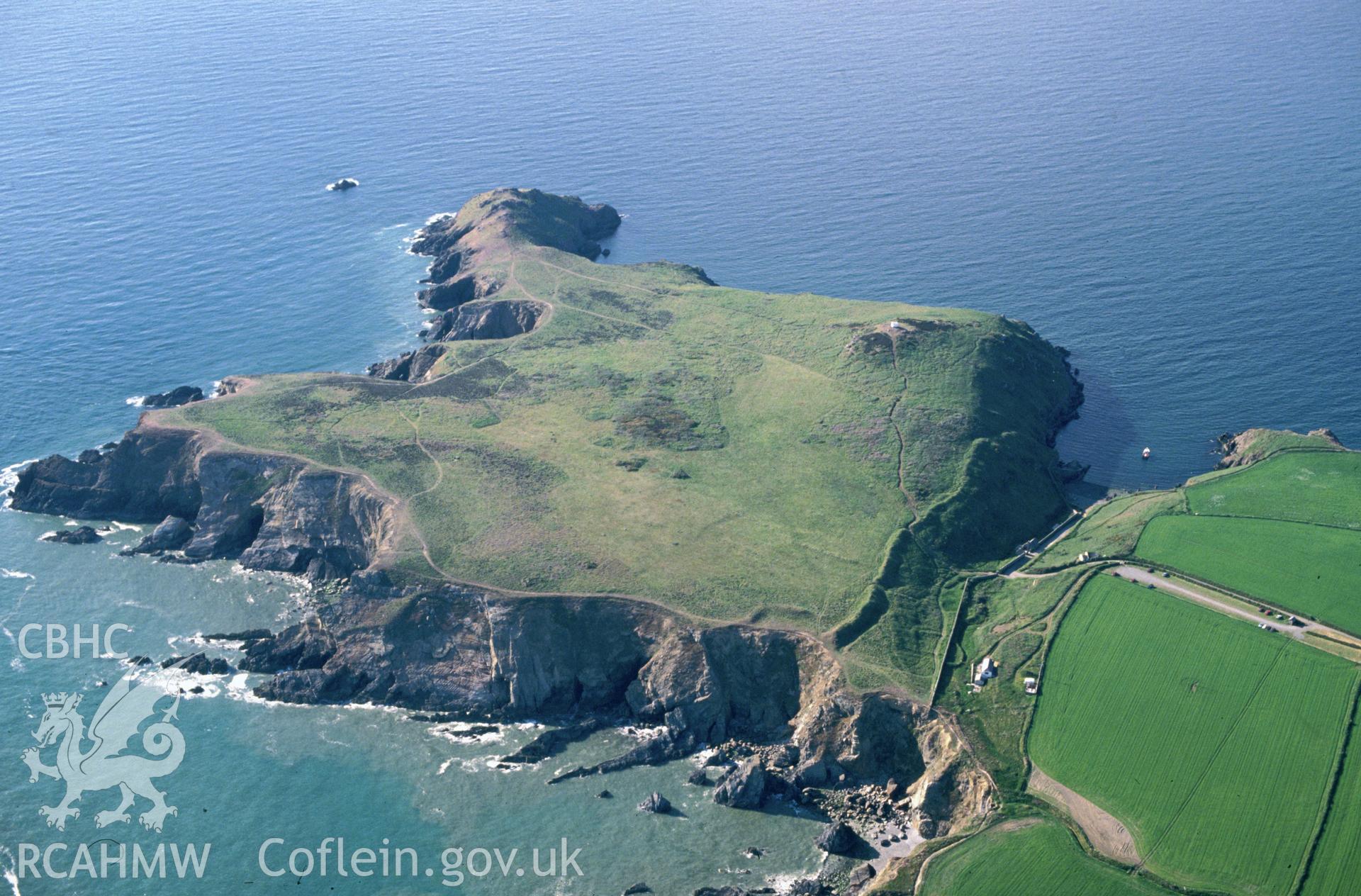 Slide of RCAHMW colour oblique aerial photograph of Deer Park Promontory Fort, taken by C.R. Musson, 3/6/1991.