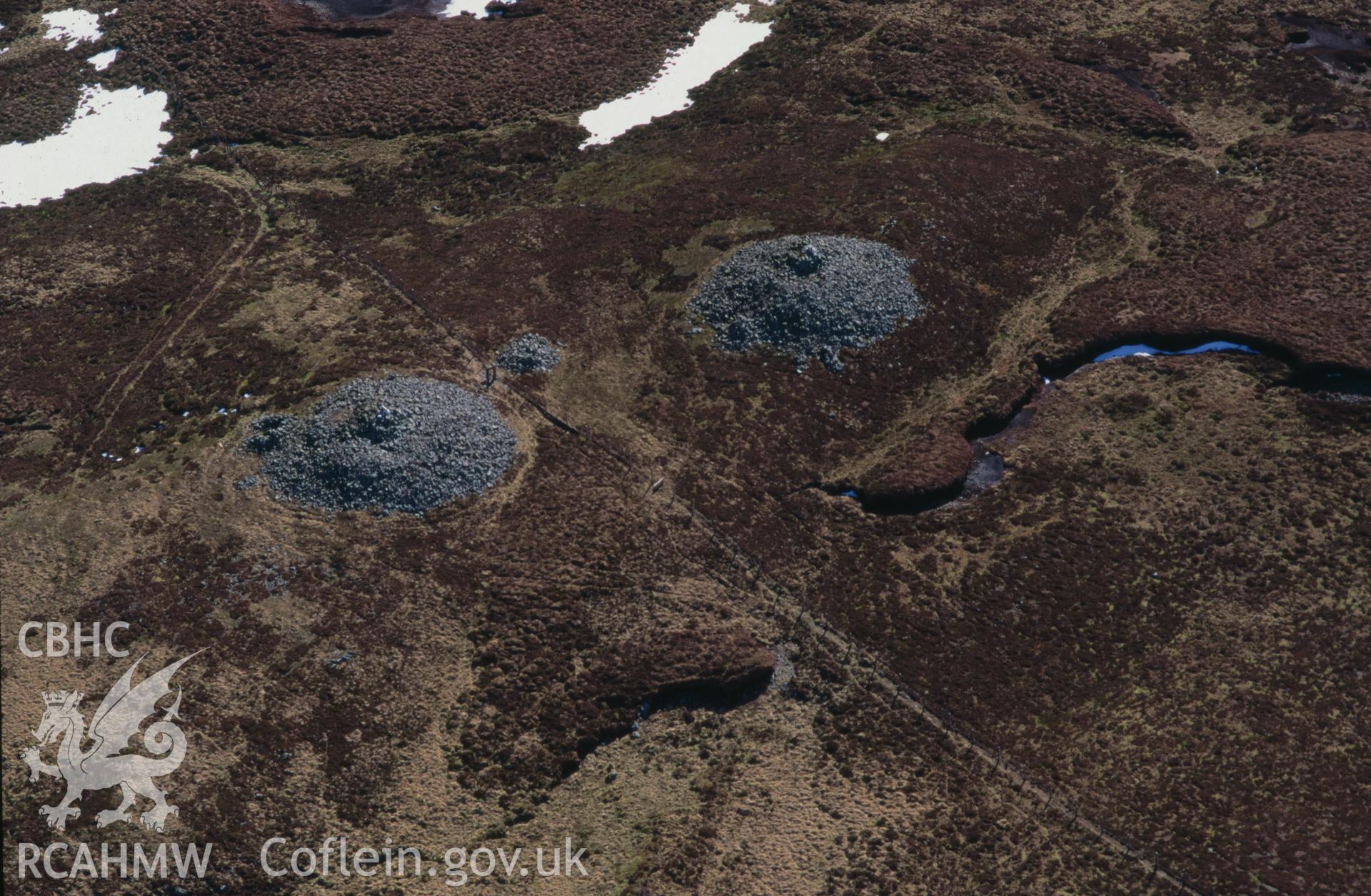 RCAHMW colour oblique aerial photograph of Carn Biga I, Pumlumon Cwmbiga taken on 23/03/1995 by C.R. Musson