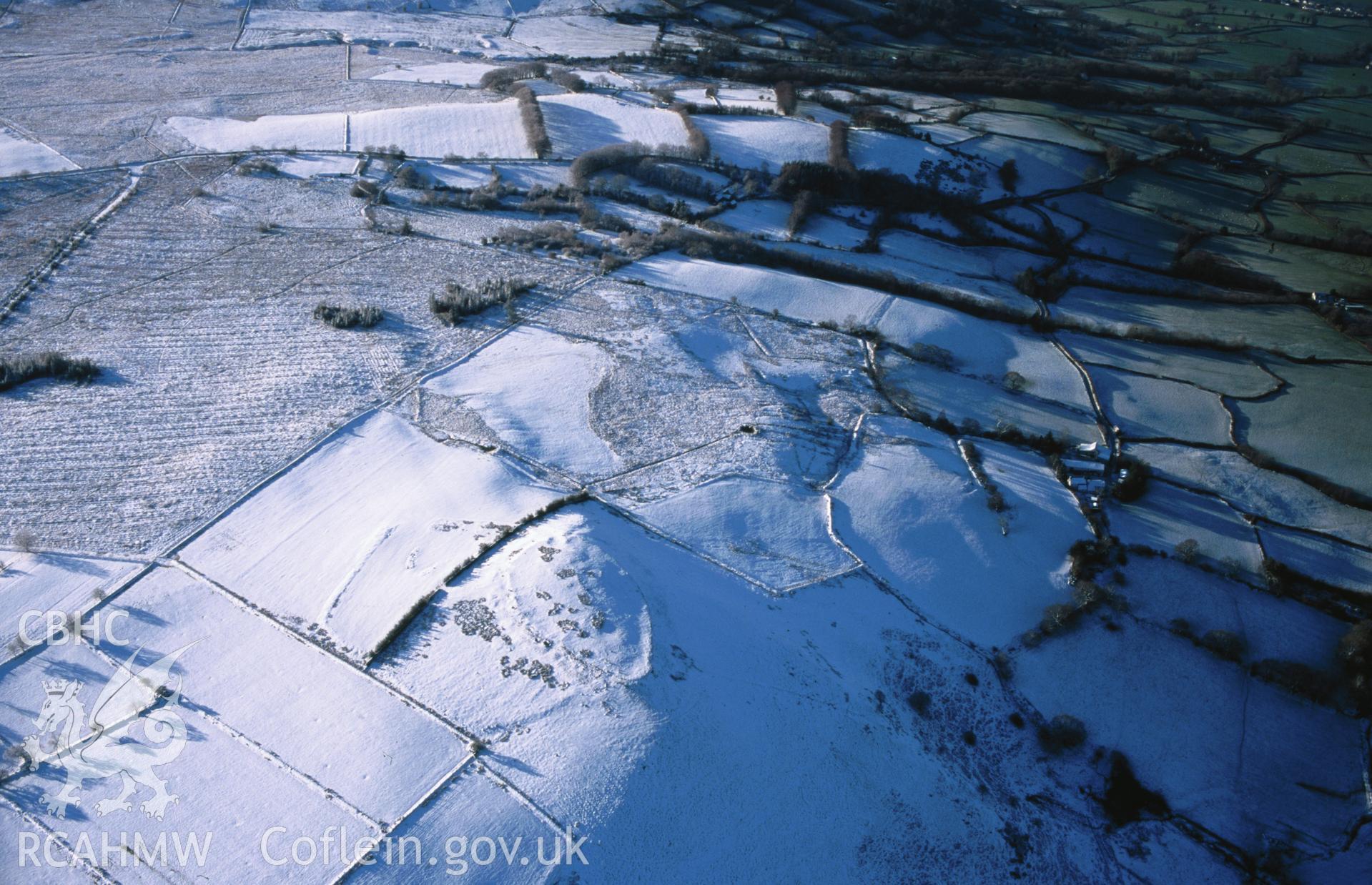 Slide of RCAHMW colour oblique aerial photograph of Caer Cadwgan, taken by T.G. Driver, 19/12/1999.