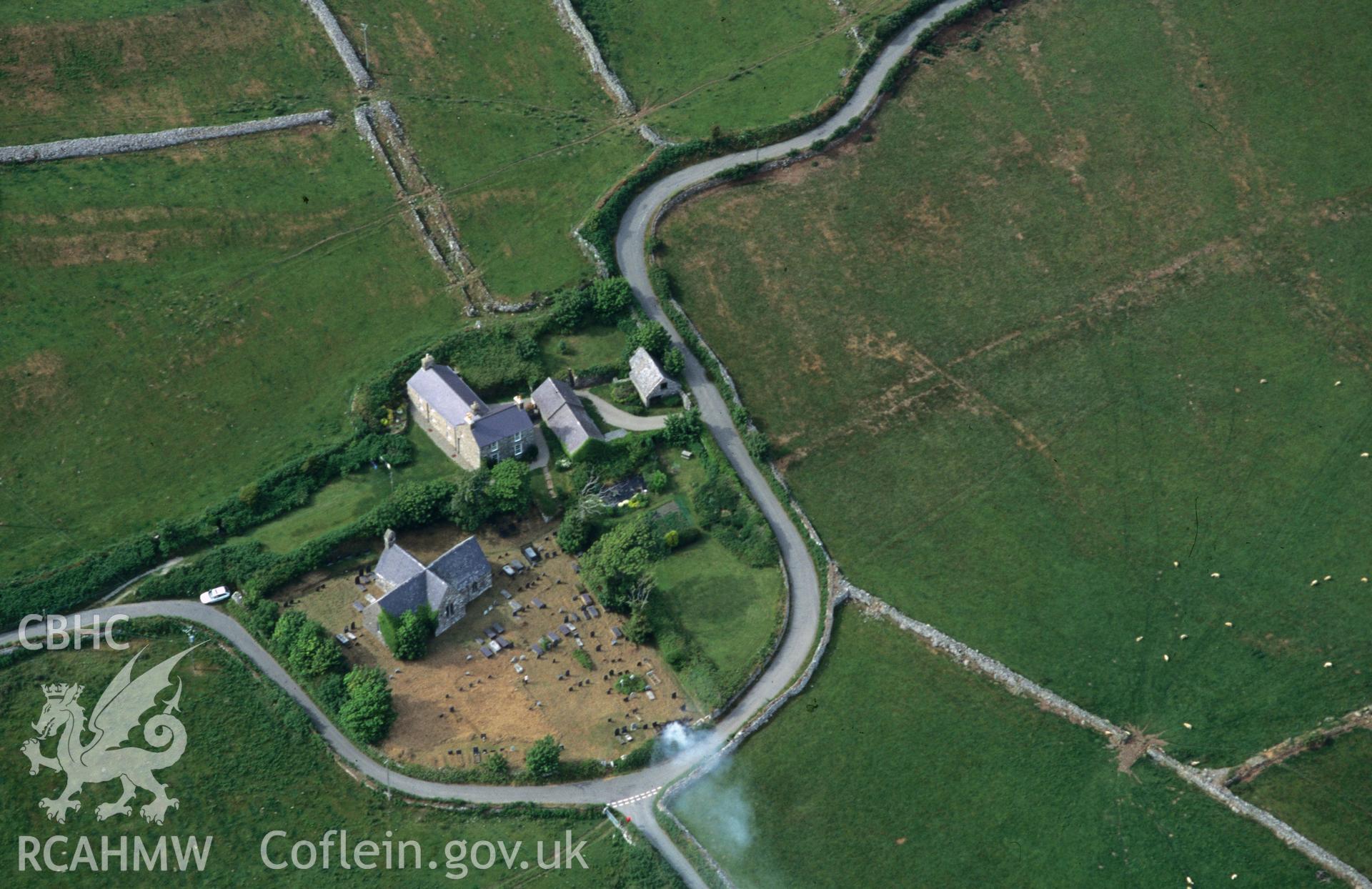 Slide of RCAHMW colour oblique aerial photograph of St Aelrhiw's Church, Rhiw, taken by C.R. Musson, 27/7/1996.