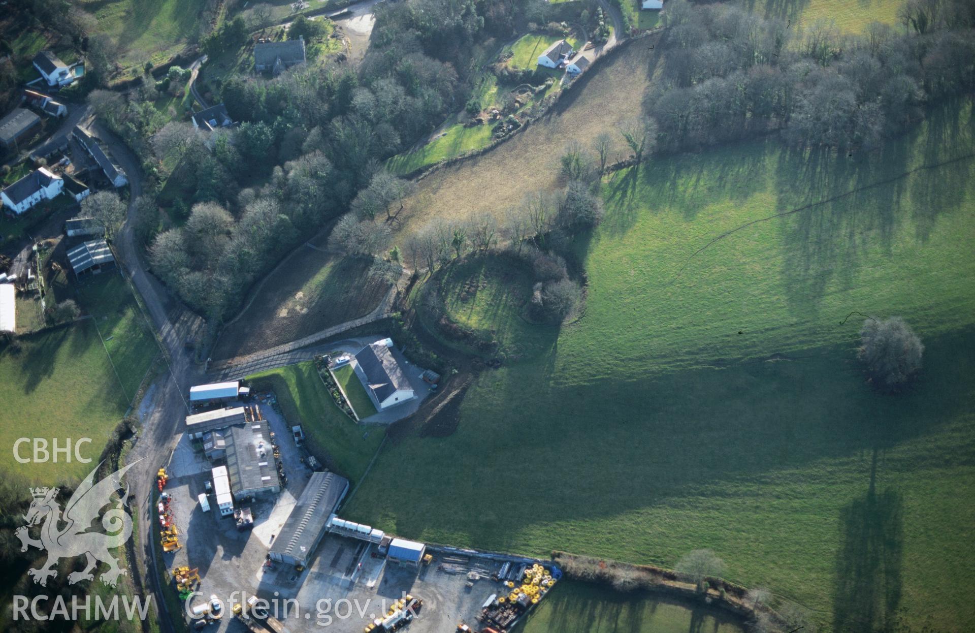 Slide of RCAHMW colour oblique aerial photograph of Castell;castell Cynon, Lampeter Velfrey, taken by C.R. Musson, 2/2/1997.