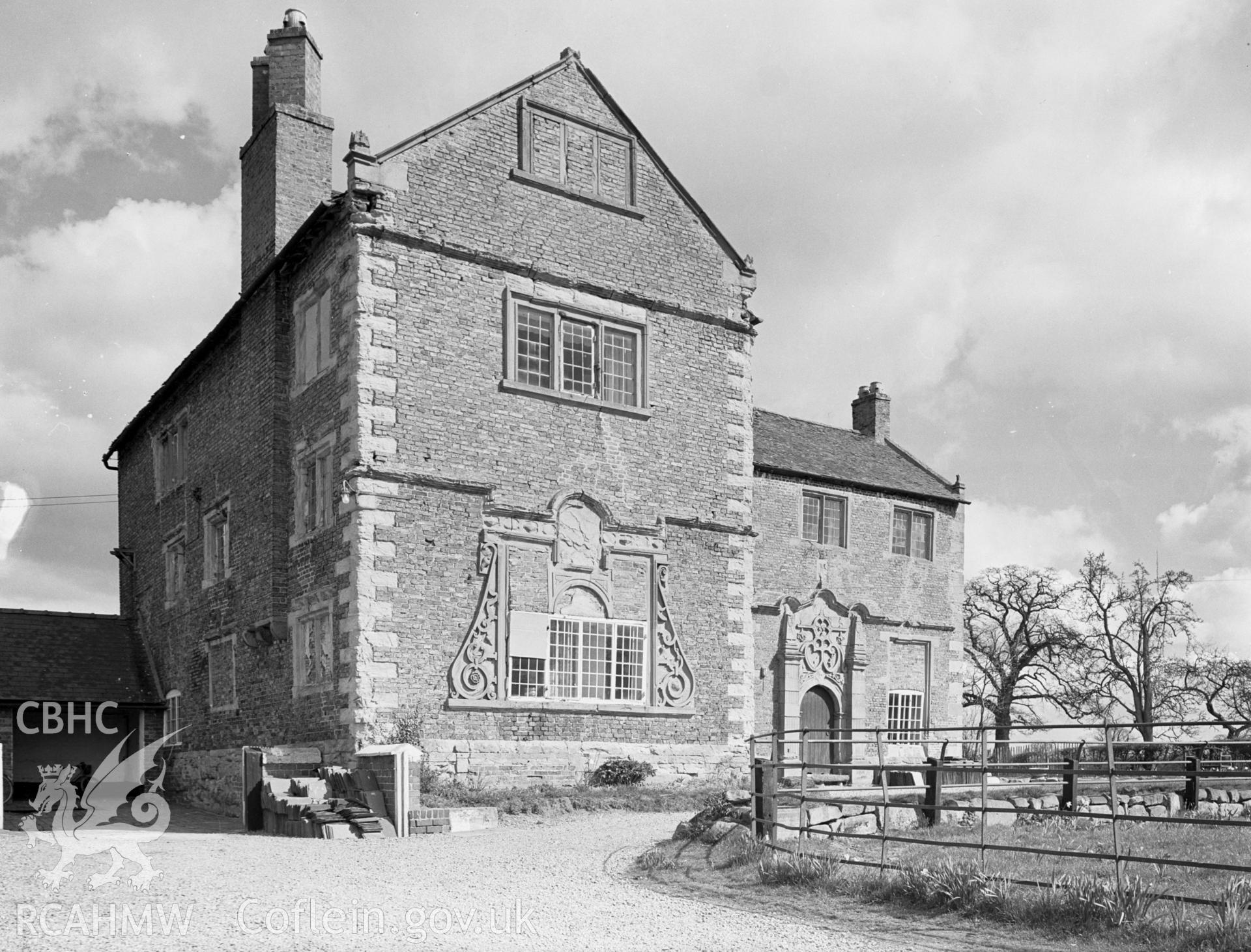 A view of Halghton Hall built in 1662. A brick building with stone dressing. .