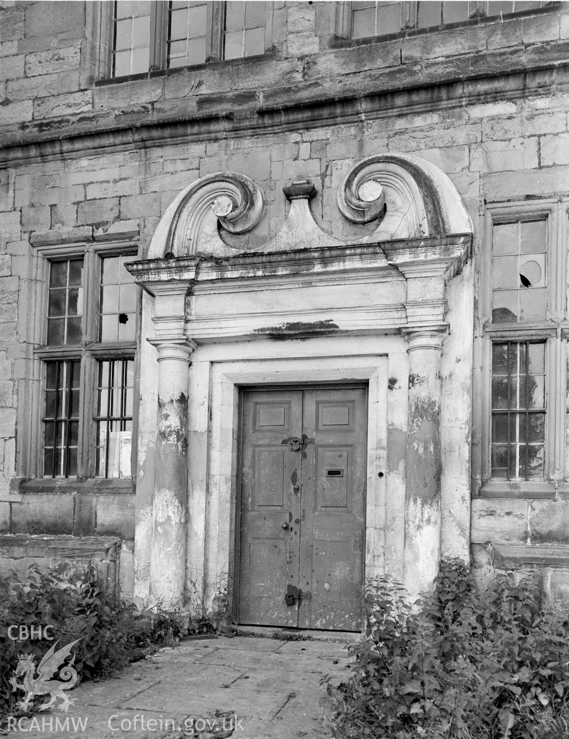 The entrance to Plas Teg. Doorway has Tuscan style pillars either side.