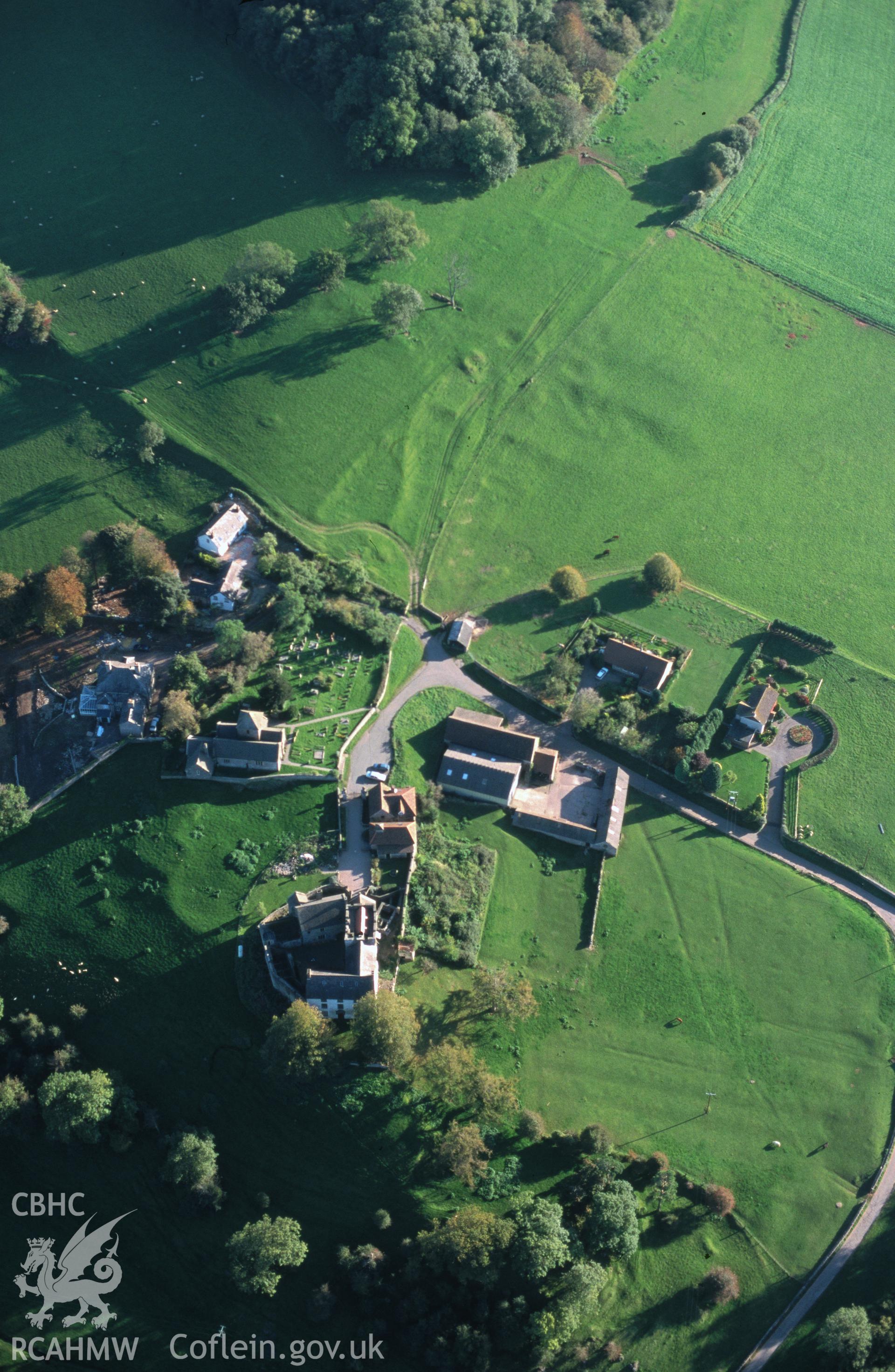 Slide of RCAHMW colour oblique aerial photograph of Penhow, Village Earthworks, taken by T.G. Driver, 18/10/1999.