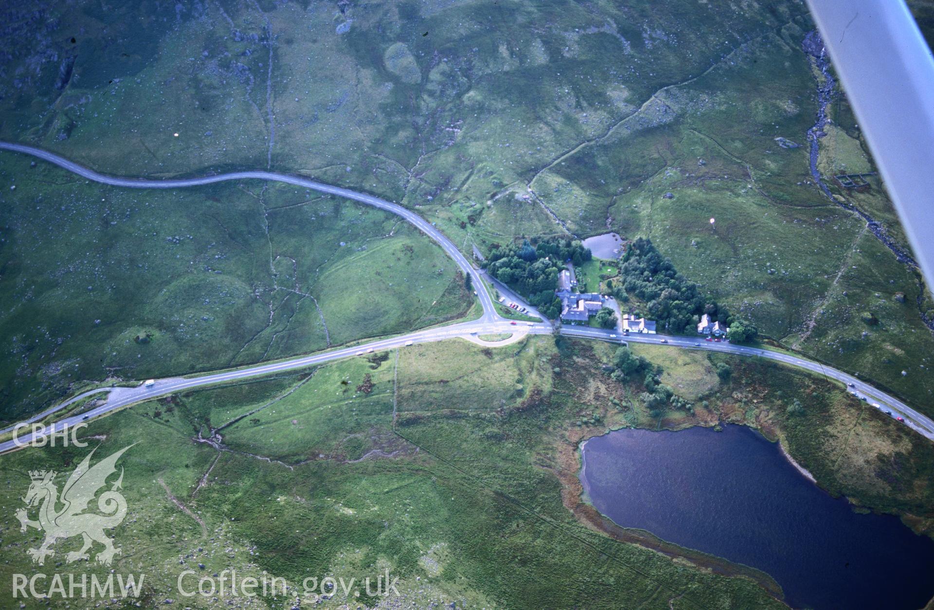 Slide of RCAHMW colour oblique aerial photograph of Pen Y Gwryd - Roman Marching Camp, taken by T.G. Driver, 20/8/1999.