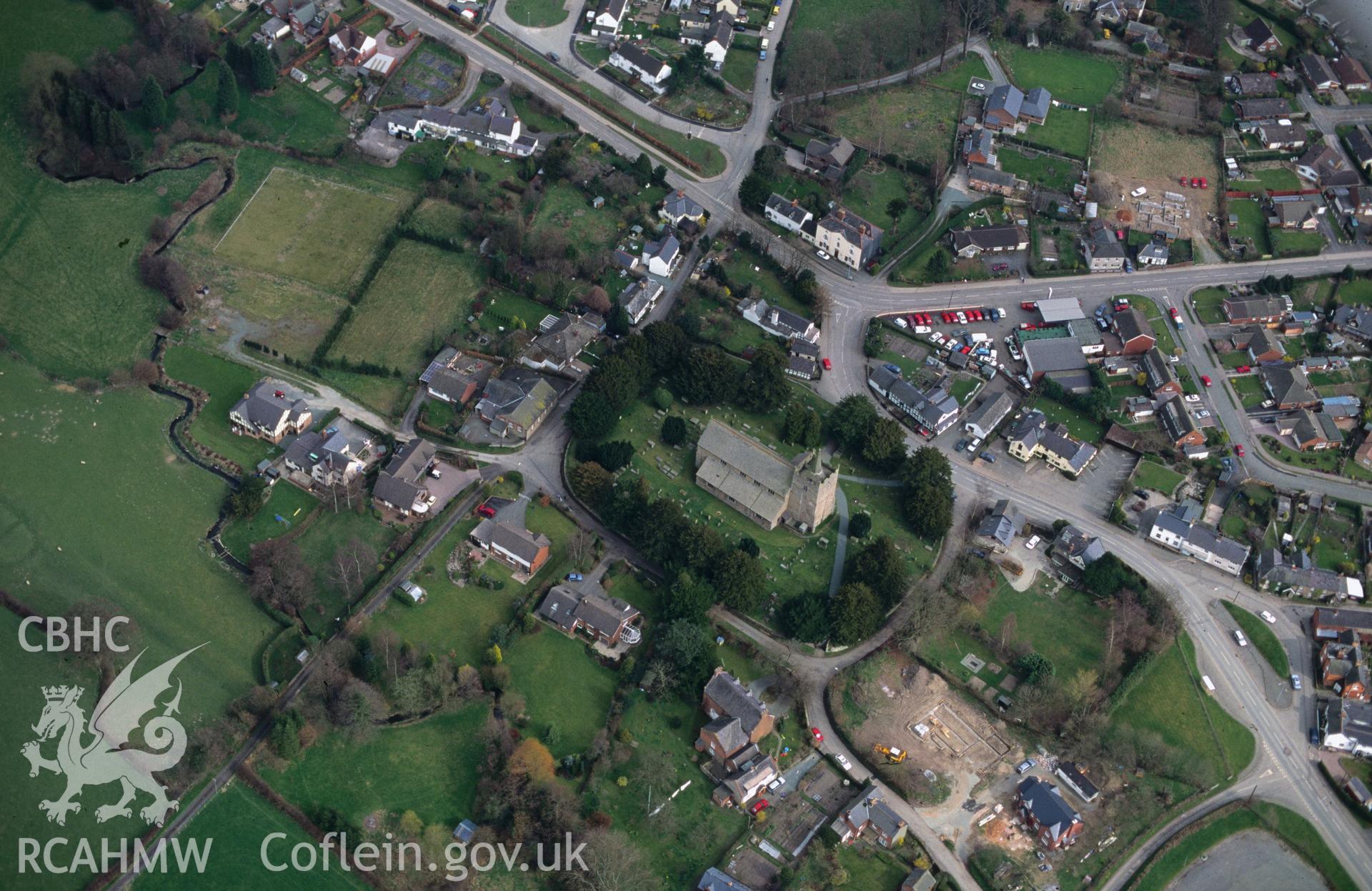 RCAHMW colour slide oblique aerial photograph of St Aelhairn's Church, Guilsfield, taken by C.R.Musson on the 11/04/1996