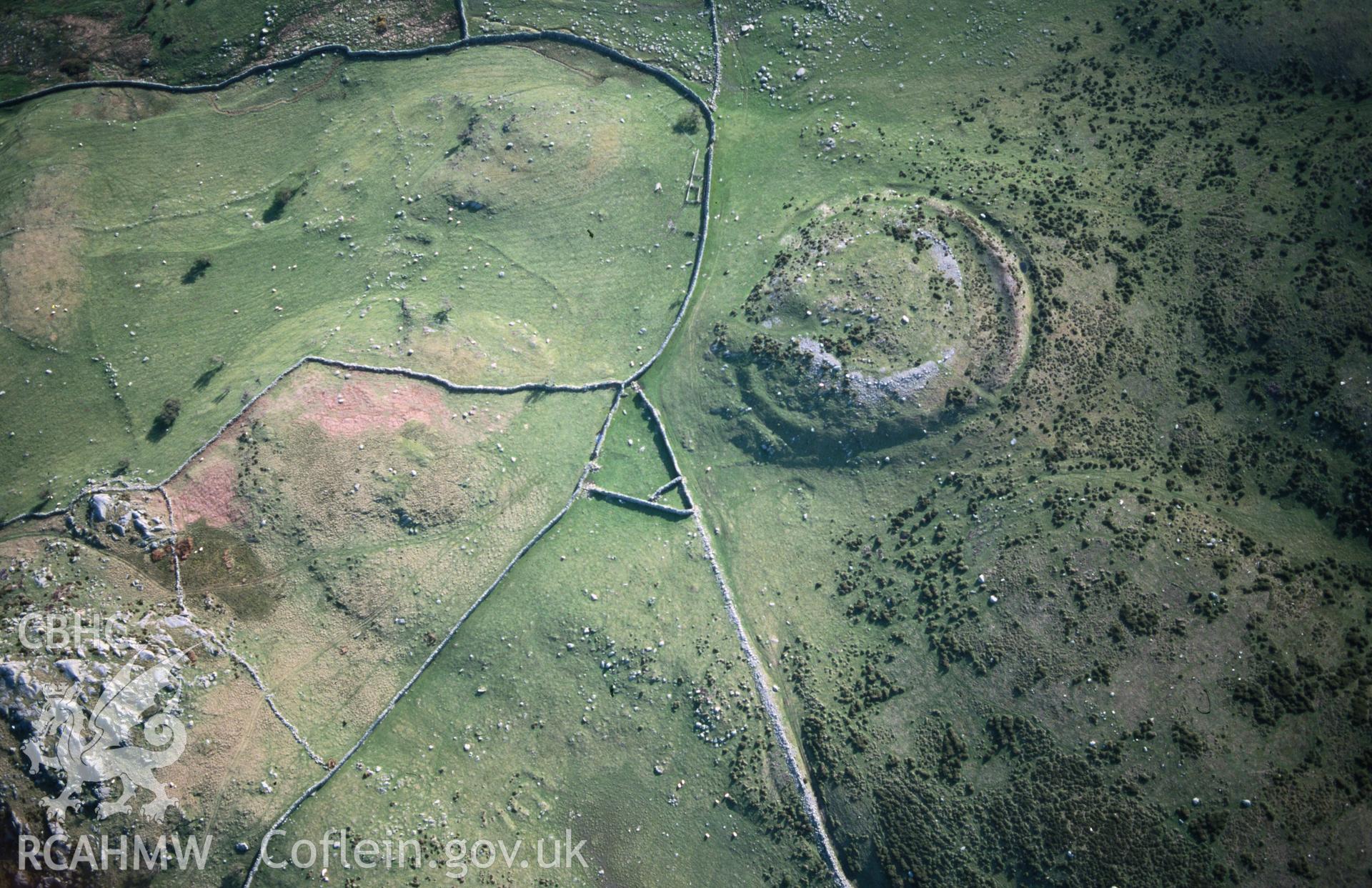 Slide of RCAHMW colour oblique aerial photograph of Caer Bach, taken by T.G. Driver, 28/4/1999.