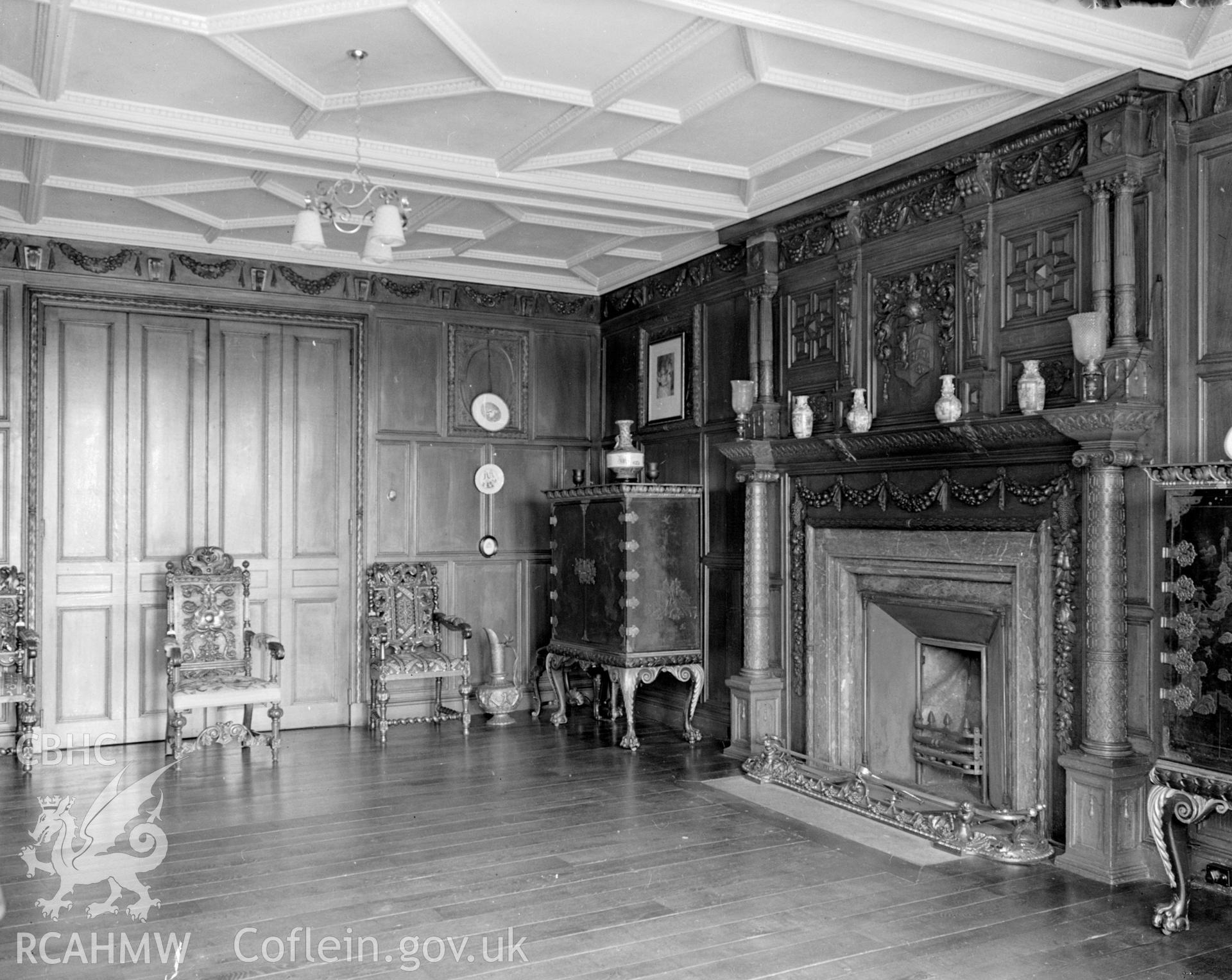 Broughton Hall south west drawing room, the floor is wooden and the ceiling is patterned plaster.