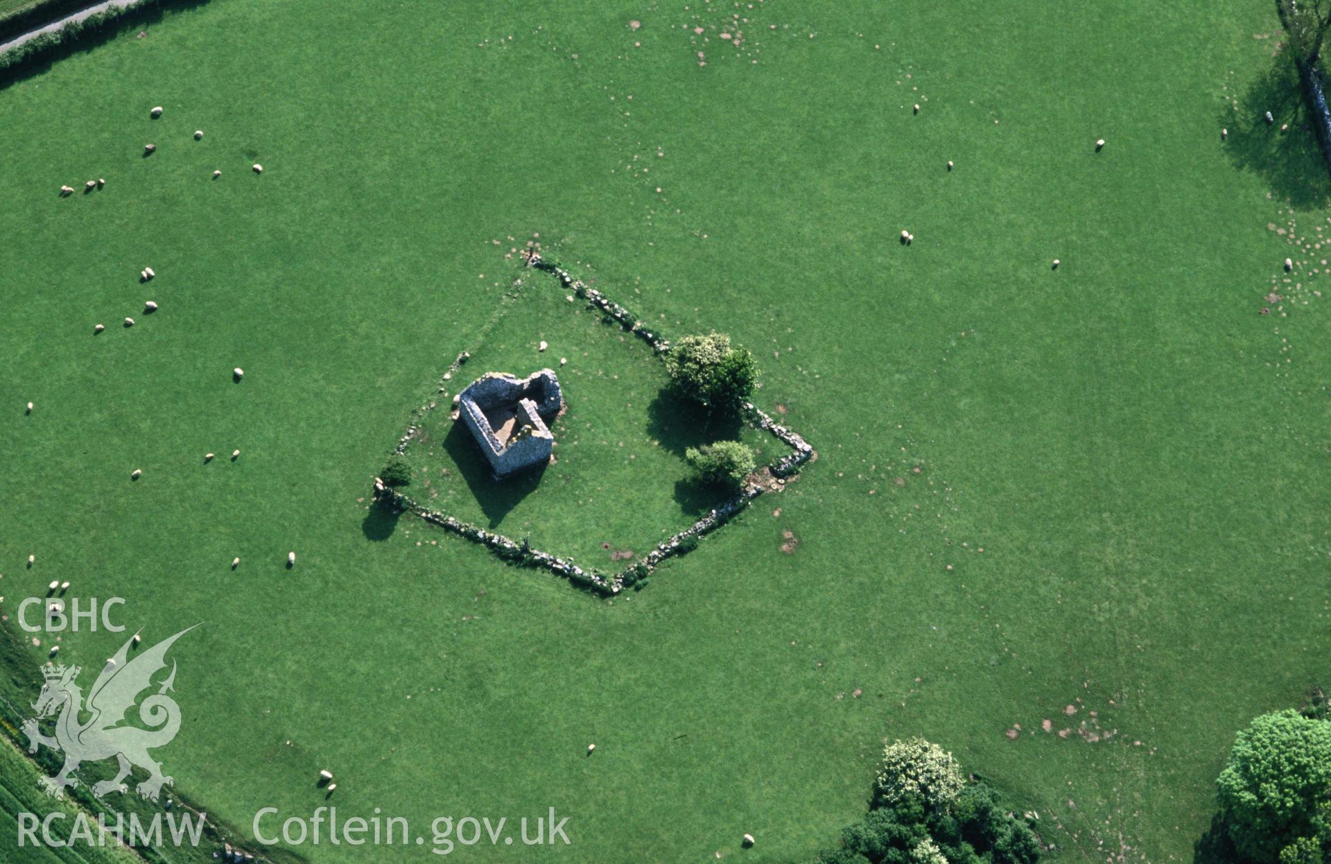 Slide of RCAHMW colour oblique aerial photograph of Capel Lligwy, taken by C.R. Musson, 30/5/1994.