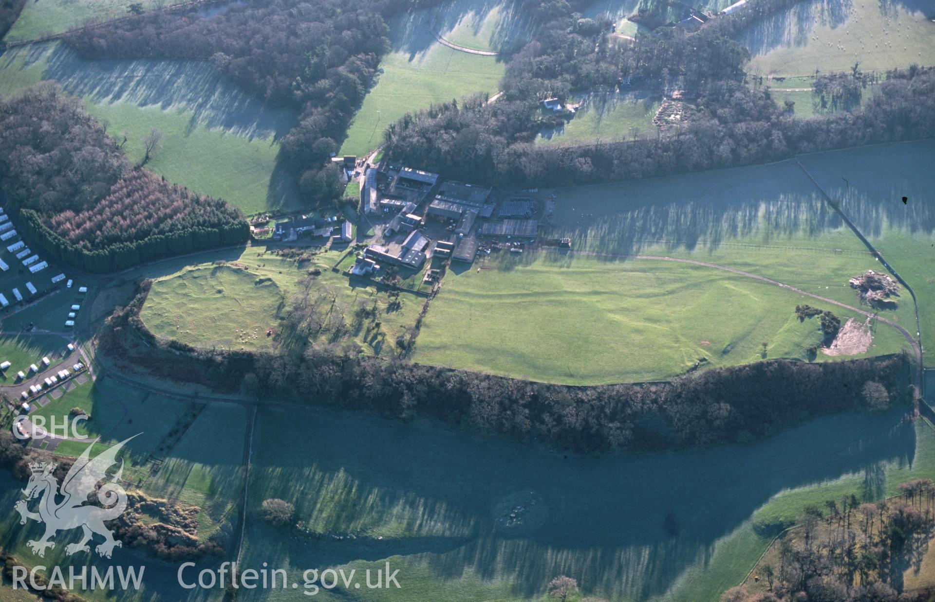 Slide of RCAHMW colour oblique aerial photograph of Parciau Hillfort, taken by T.G. Driver, 10/1/1999.