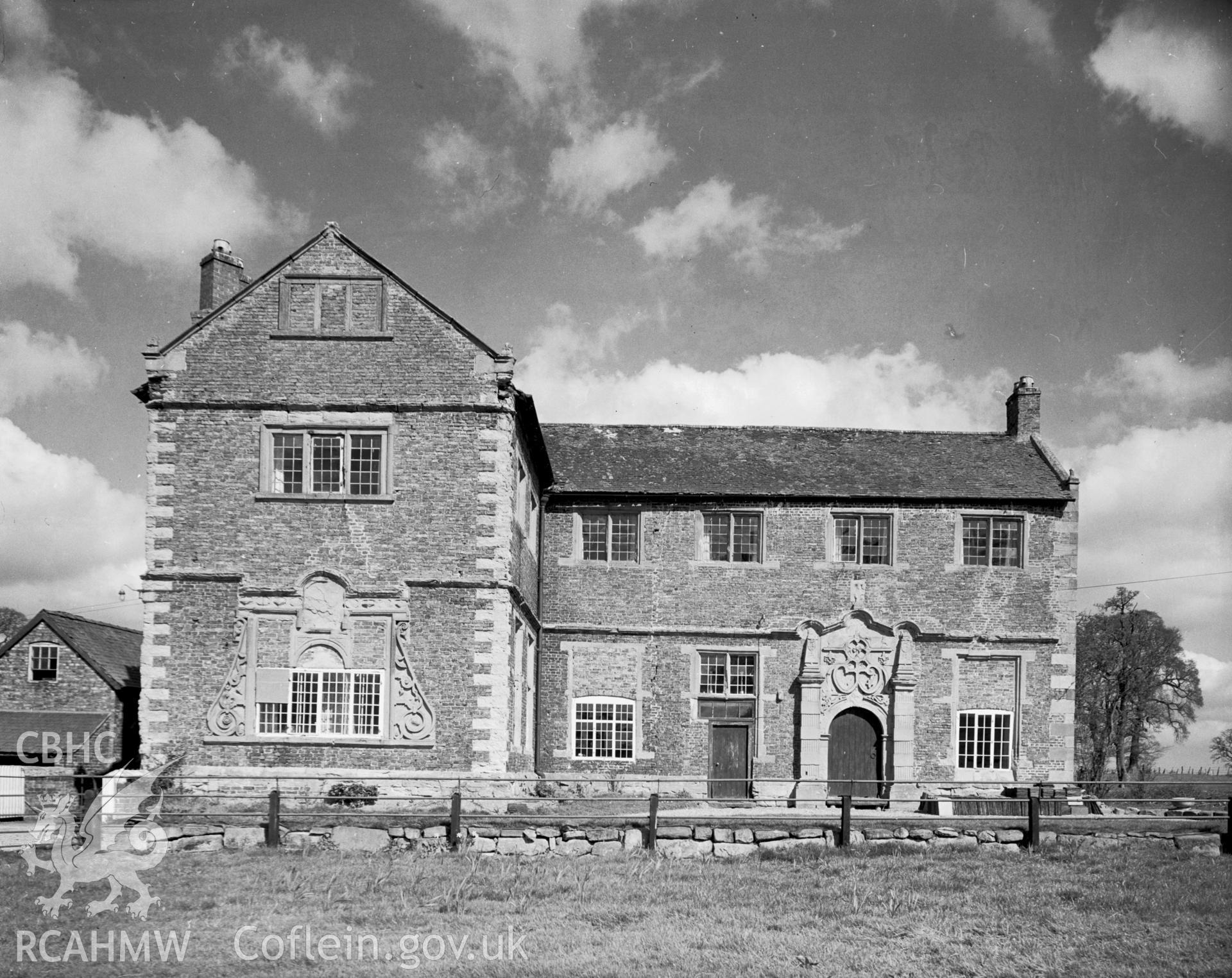 A view of the south eastern elevation, showing the Jacobean style doorway of carved stone.