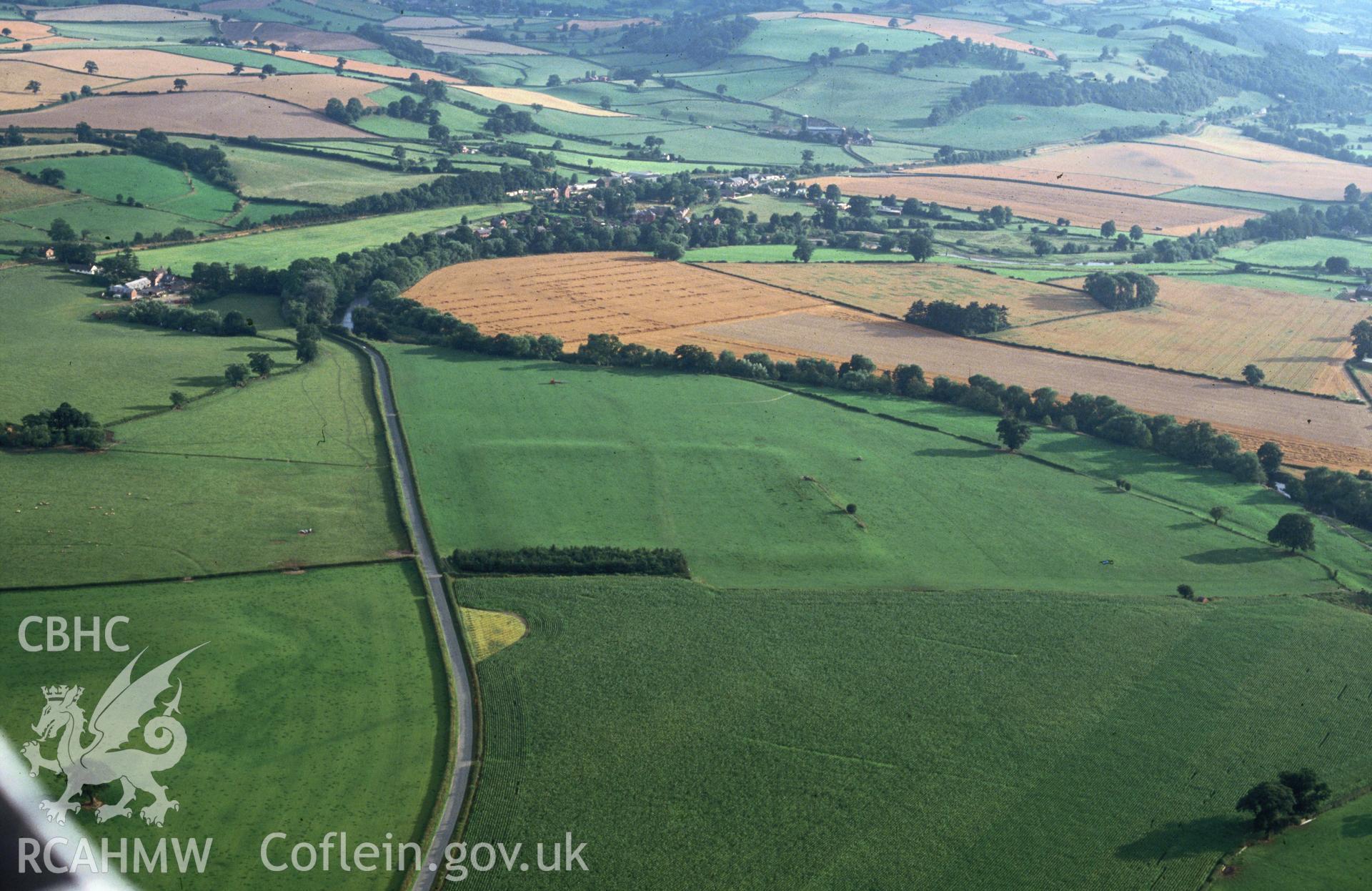 Slide of RCAHMW colour oblique aerial photograph of Forden Gaer Roman Fort, taken by C.R. Musson, 5/8/1994.