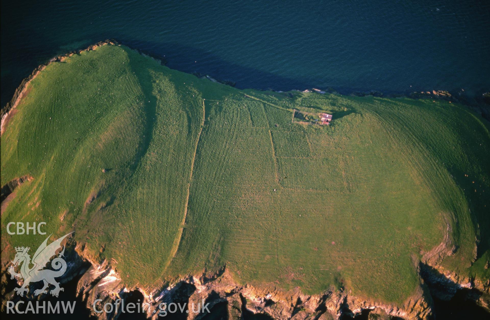 Slide of RCAHMW colour oblique aerial photograph of St Tudwalis' Head, taken by C.R. Musson, 9/5/1989.