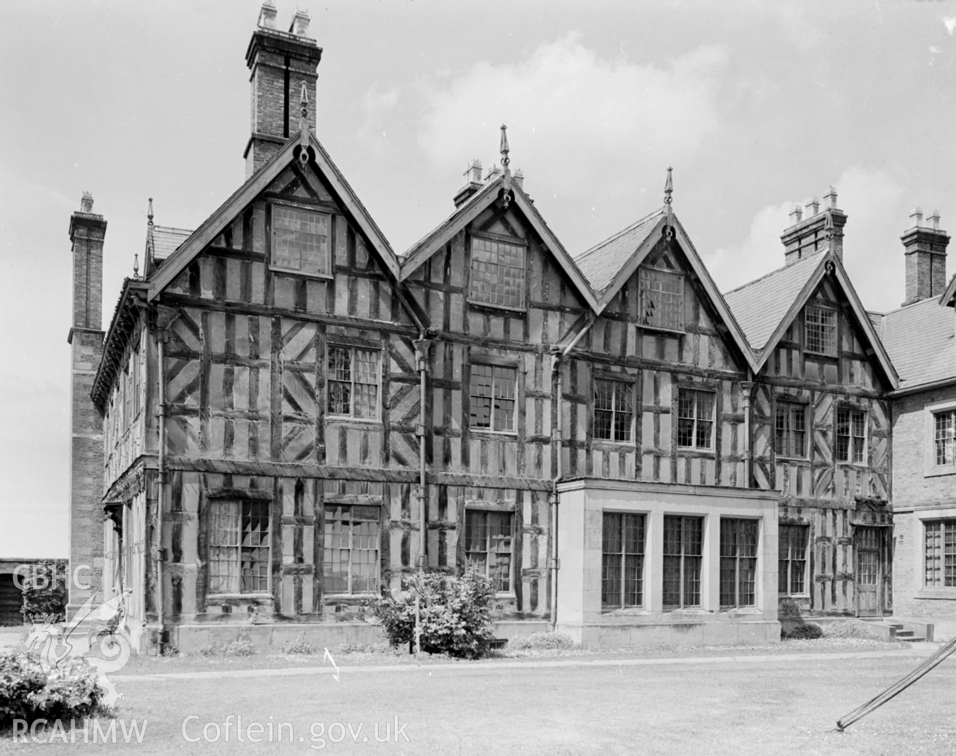 A view of the eastern elevation. A small rectangular out of character (brick) extension can be seen.