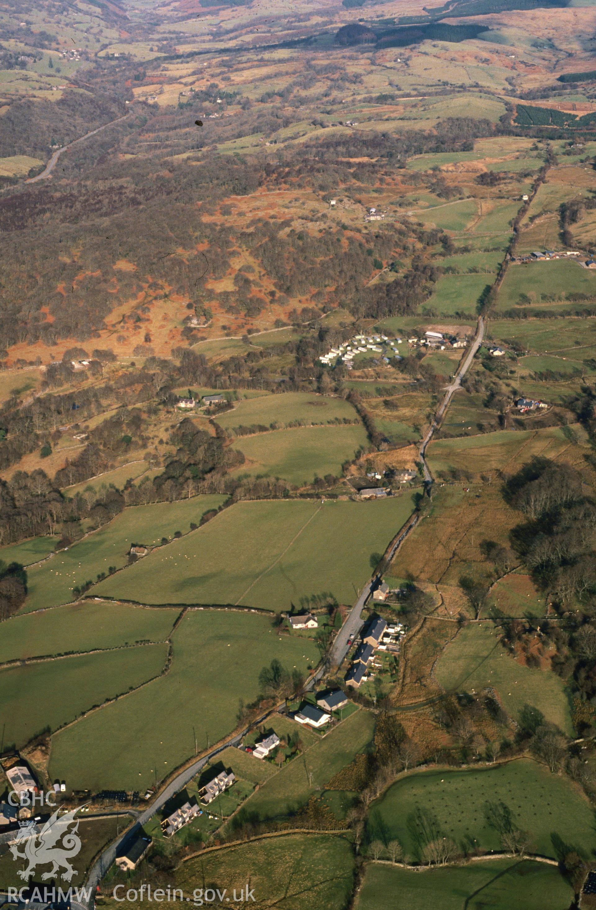 Slide of RCAHMW colour oblique aerial photograph of Brithdir Roman Fort, taken by C.R. Musson, 26/2/1991.