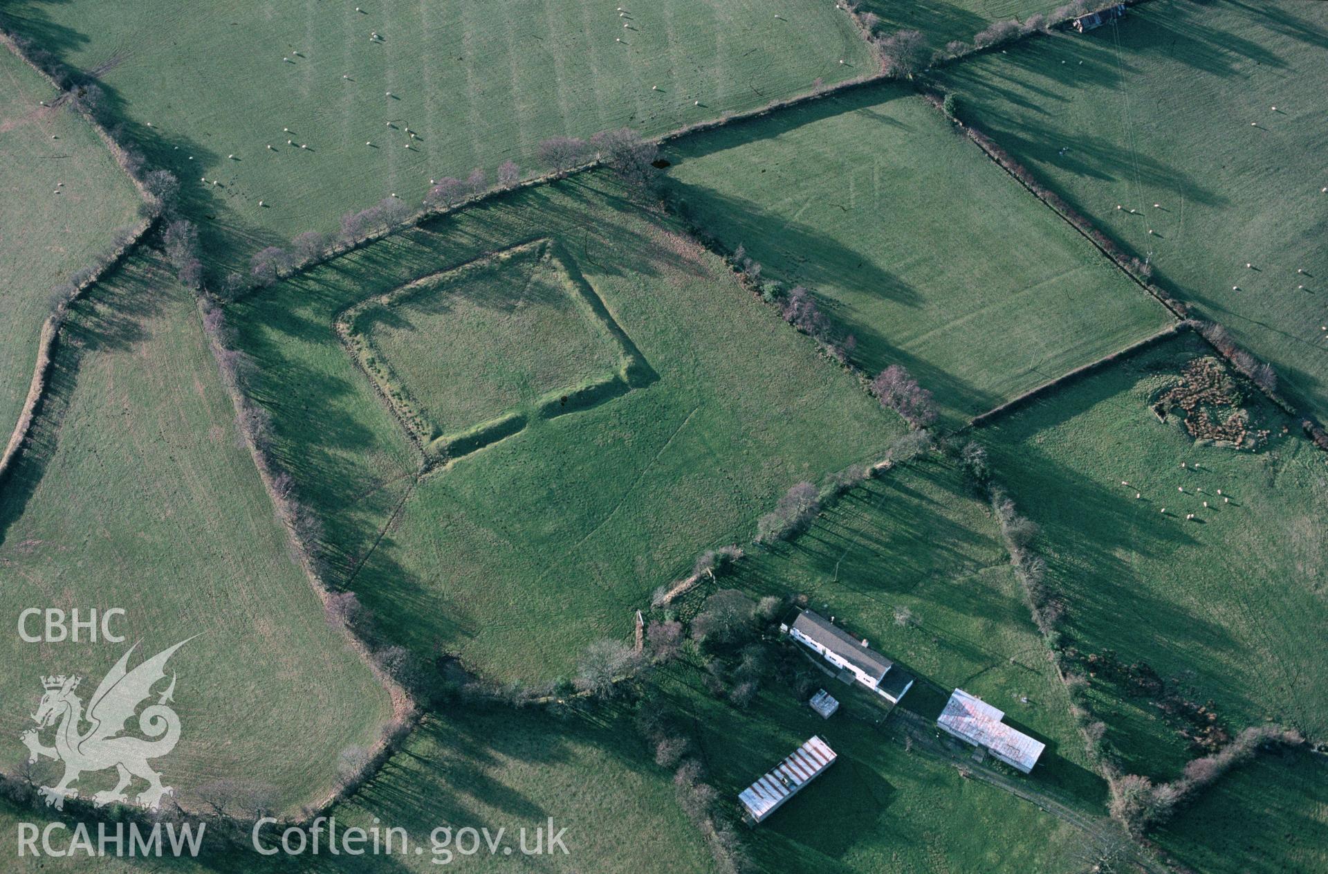 Slide of RCAHMW colour oblique aerial photograph of Gaer, Llanfair Caereinion;gibbet Hill, Possible Roman Fortlet, taken by C.R. Musson, 14/2/1997.