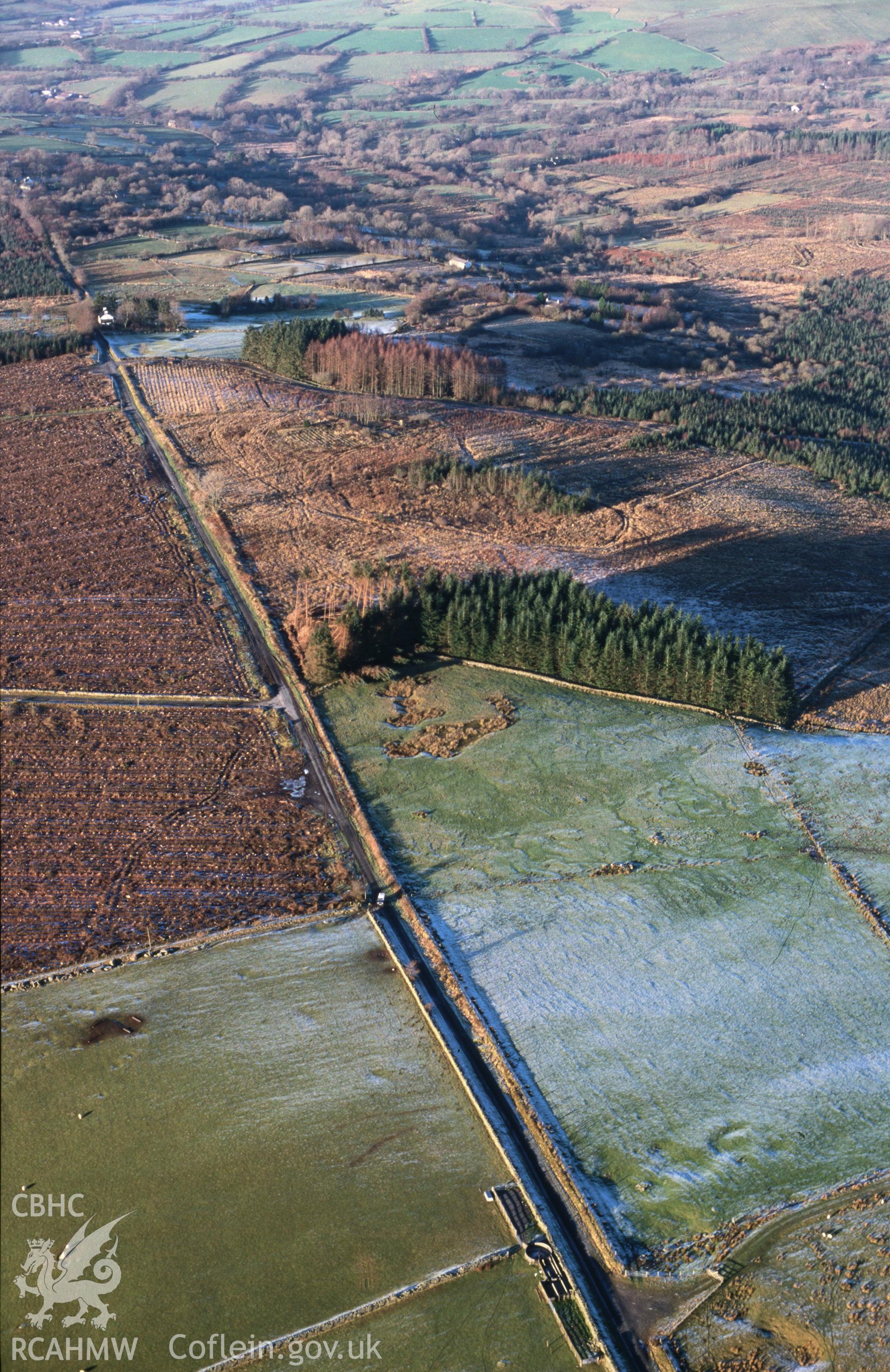 Slide of RCAHMW colour oblique aerial photograph of Pant-teg-uchaf;llanio I; Cellan Roman Practice Camp, taken by T.G. Driver, 11/1/1999.