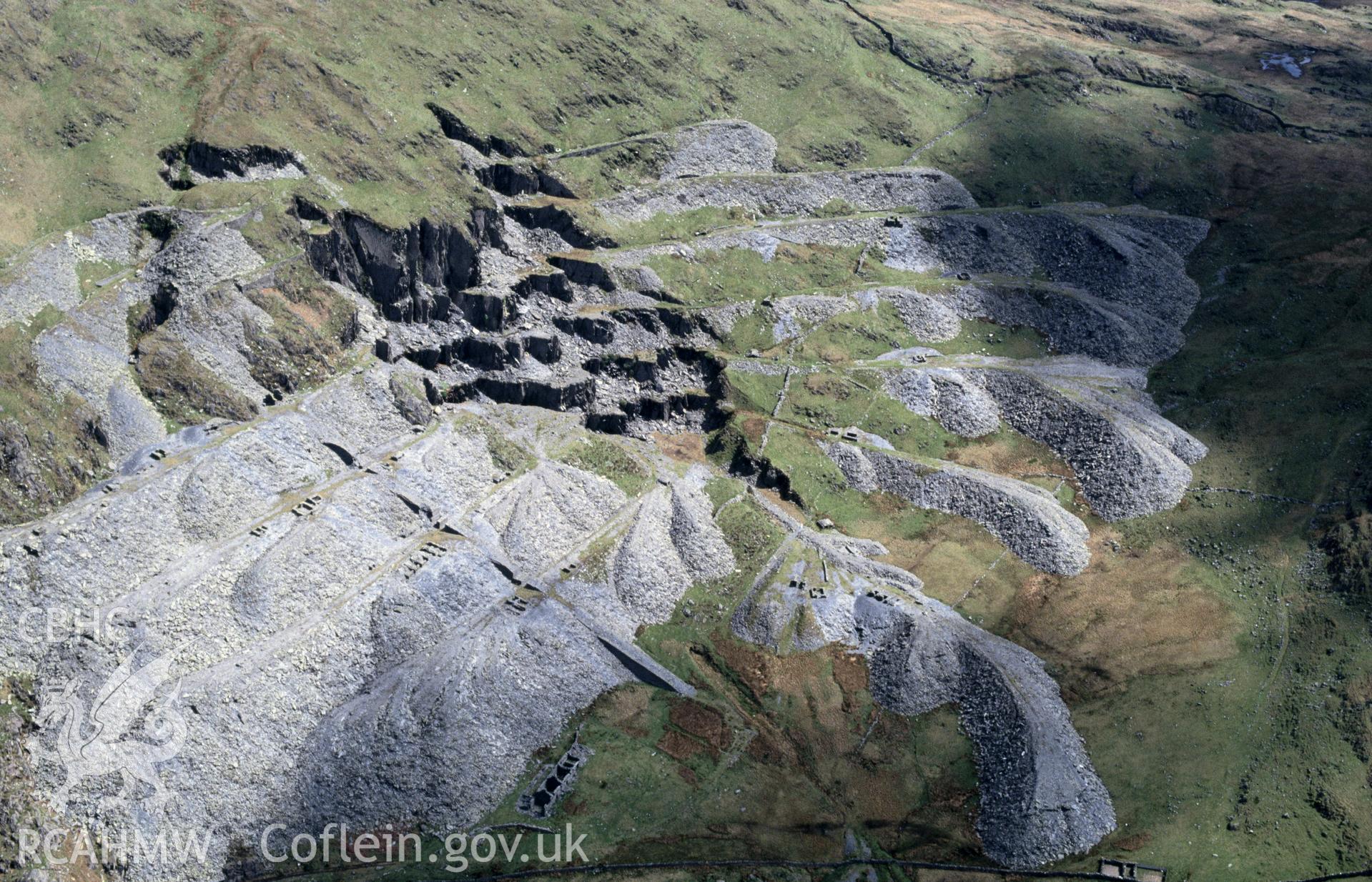 Slide of RCAHMW colour oblique aerial photograph of Gorseddau Slate Quarry, taken by C.R. Musson, 4/5/1993.