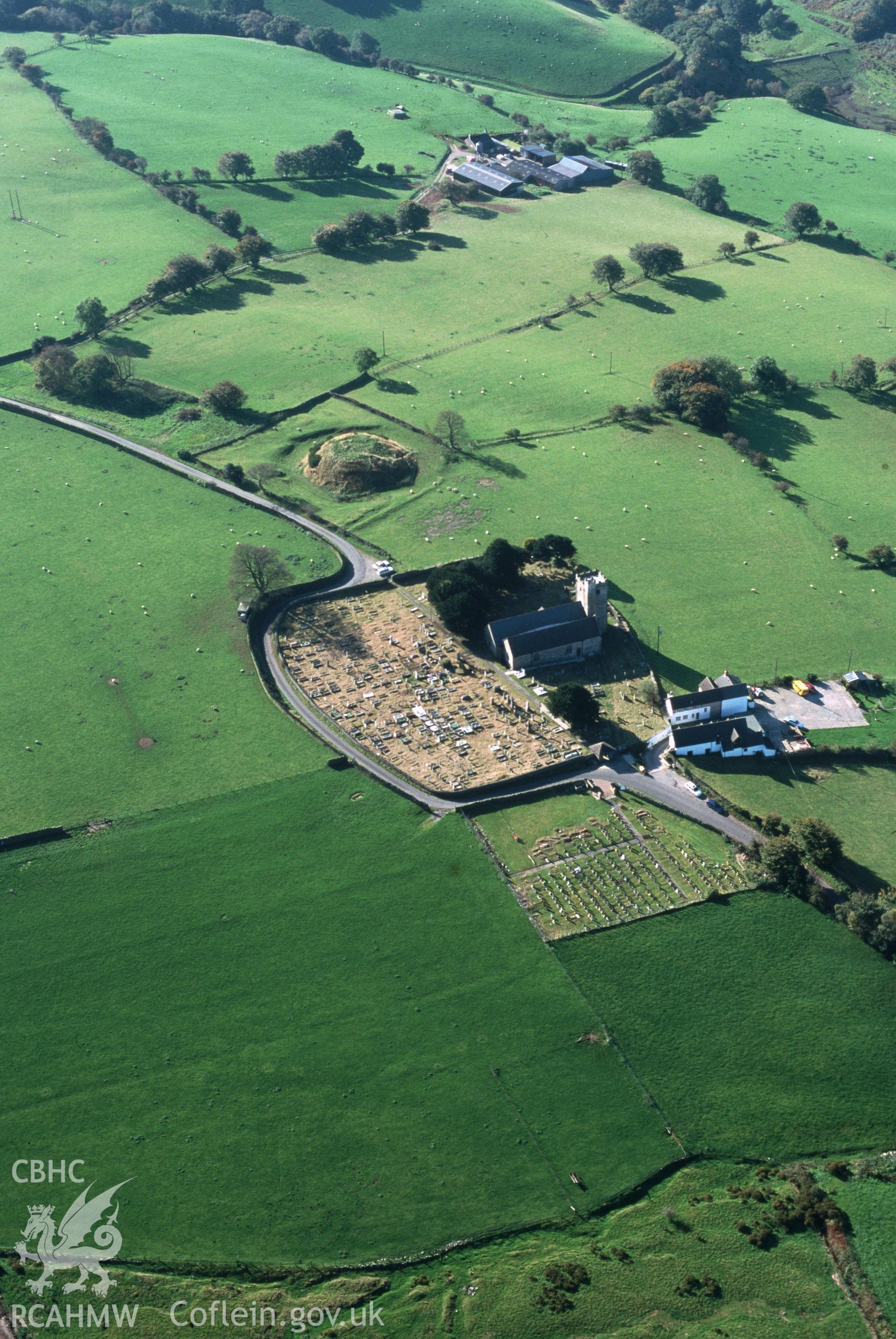 Slide of RCAHMW colour oblique aerial photograph of Twyn Tudur Motte, taken by T.G. Driver, 13/10/1999.