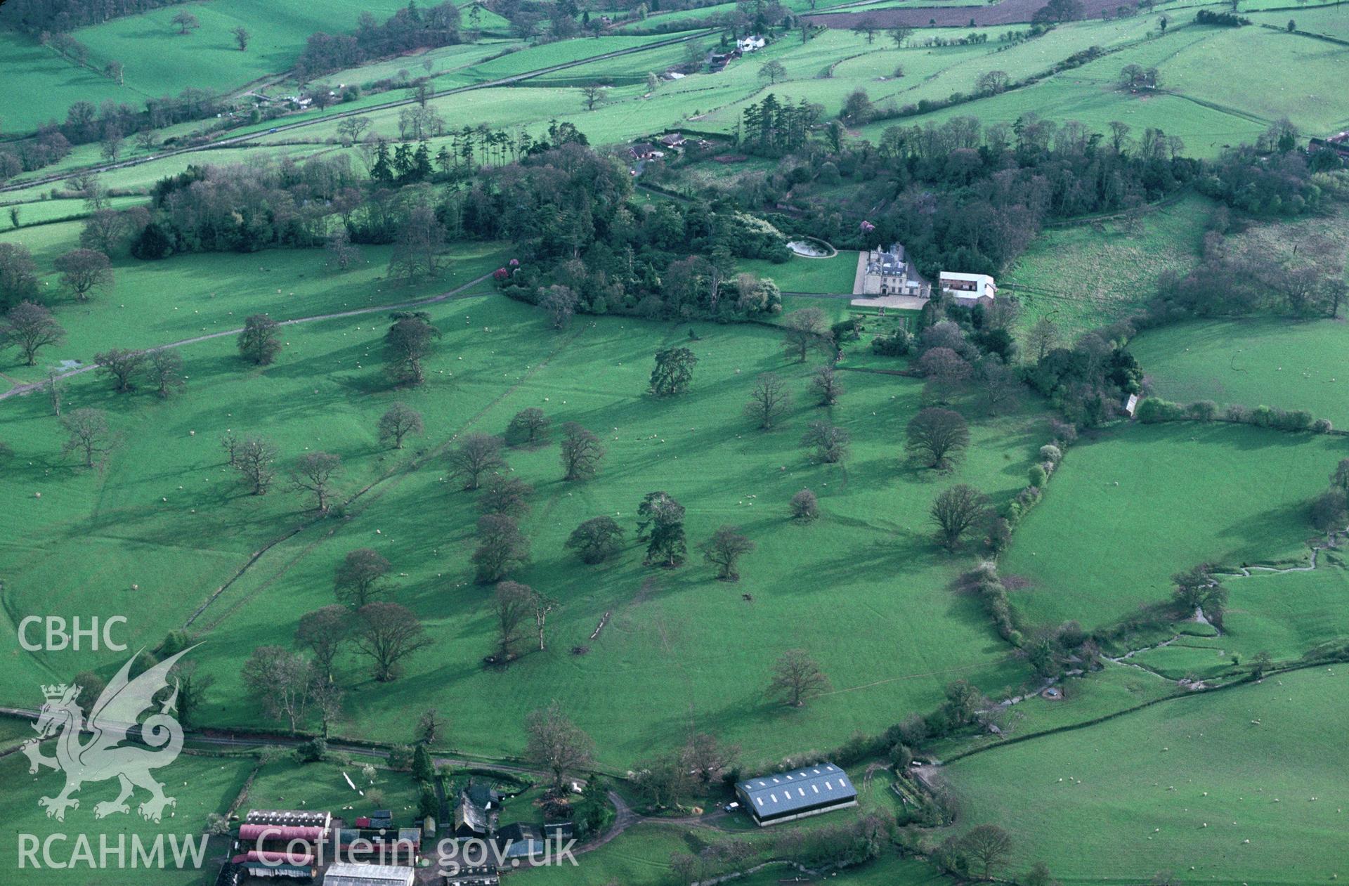 Slide of RCAHMW colour oblique aerial photograph of Llanerchydol Hall, taken by C.R. Musson, 12/4/1993.