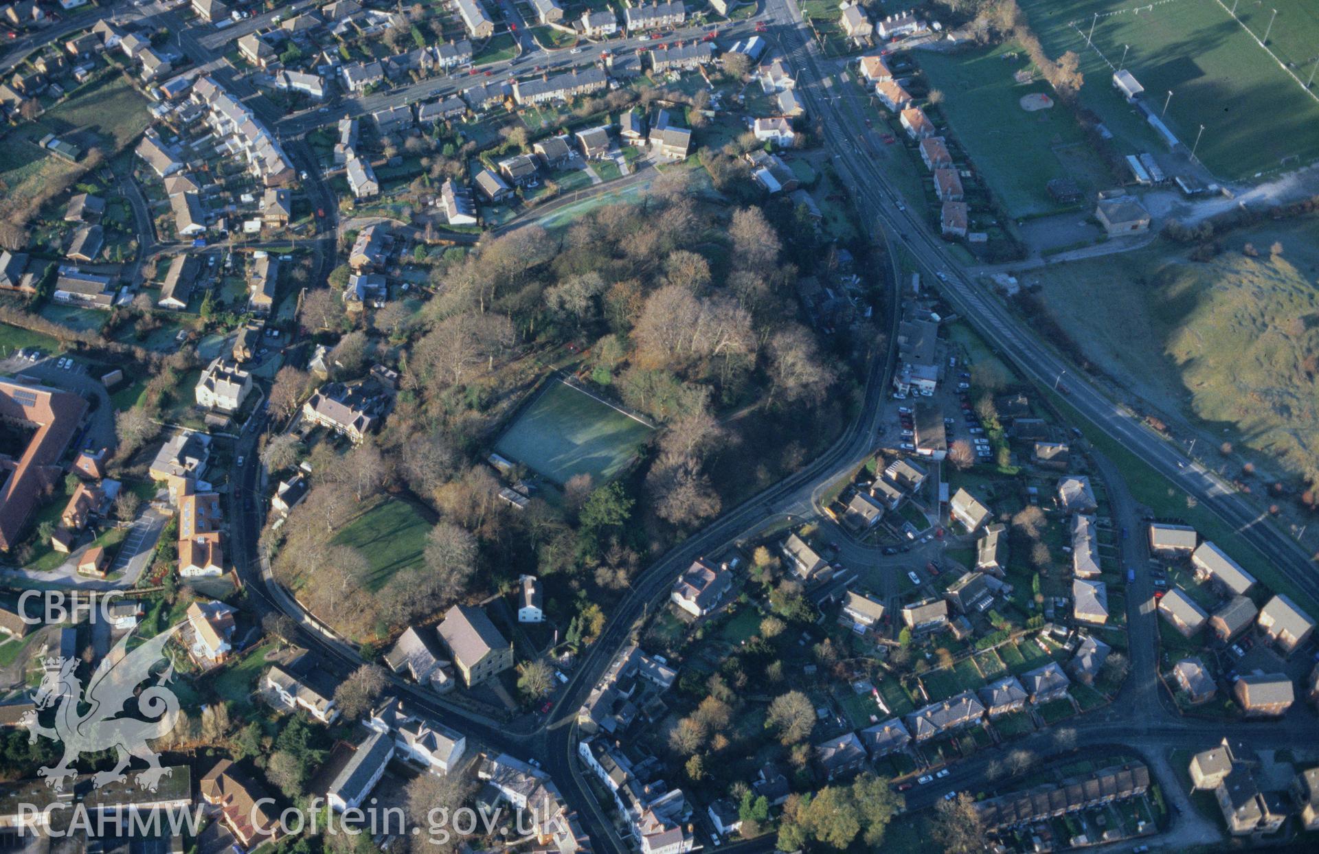 Slide of RCAHMW colour oblique aerial photograph of Bailey Hill Motte, Mold, taken by C.R. Musson, 22/12/1996.