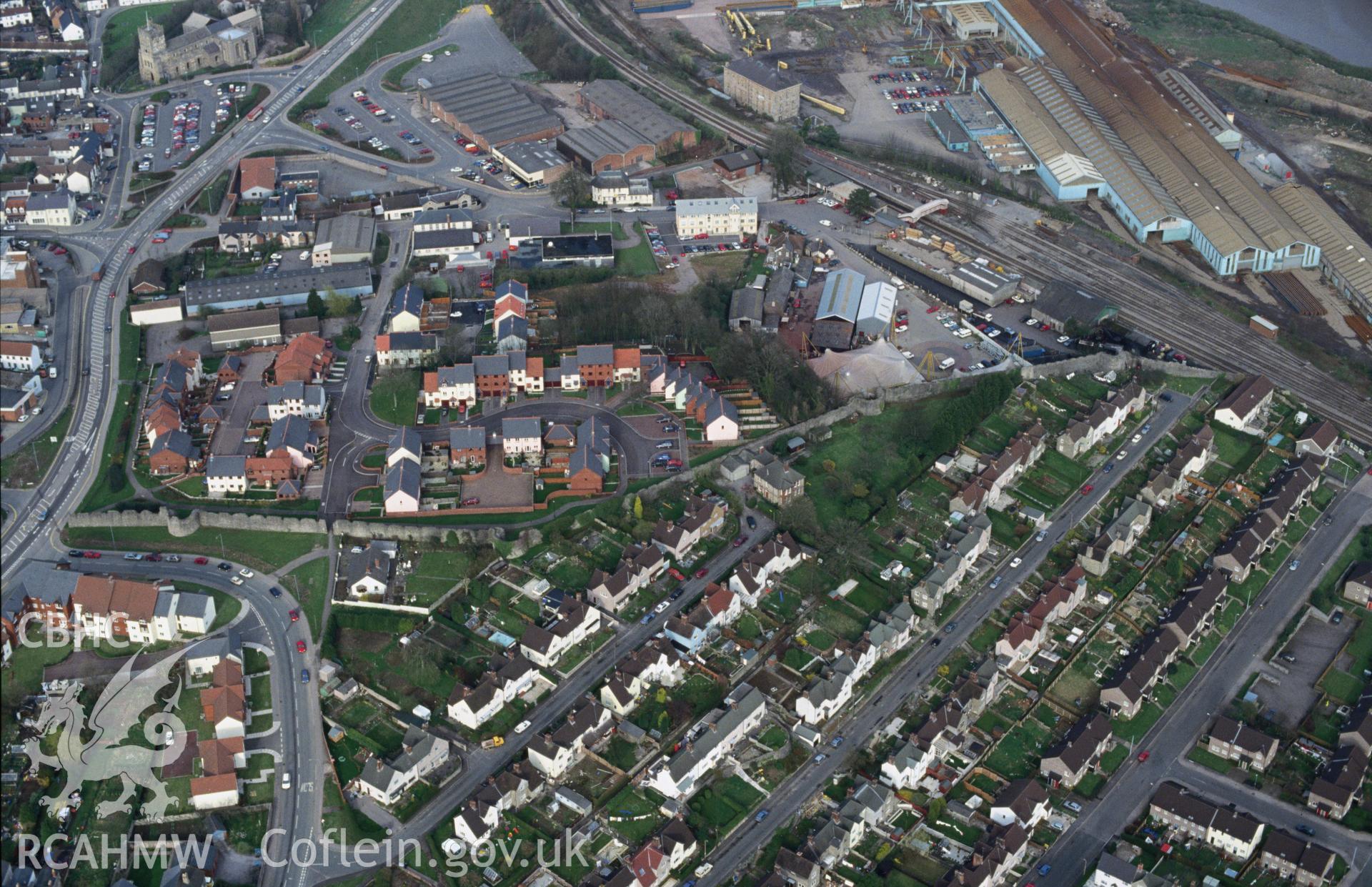 RCAHMW colour slide oblique aerial photograph of Town Wall and Gate, Chepstow, taken by C.R. Musson, 24/03/94