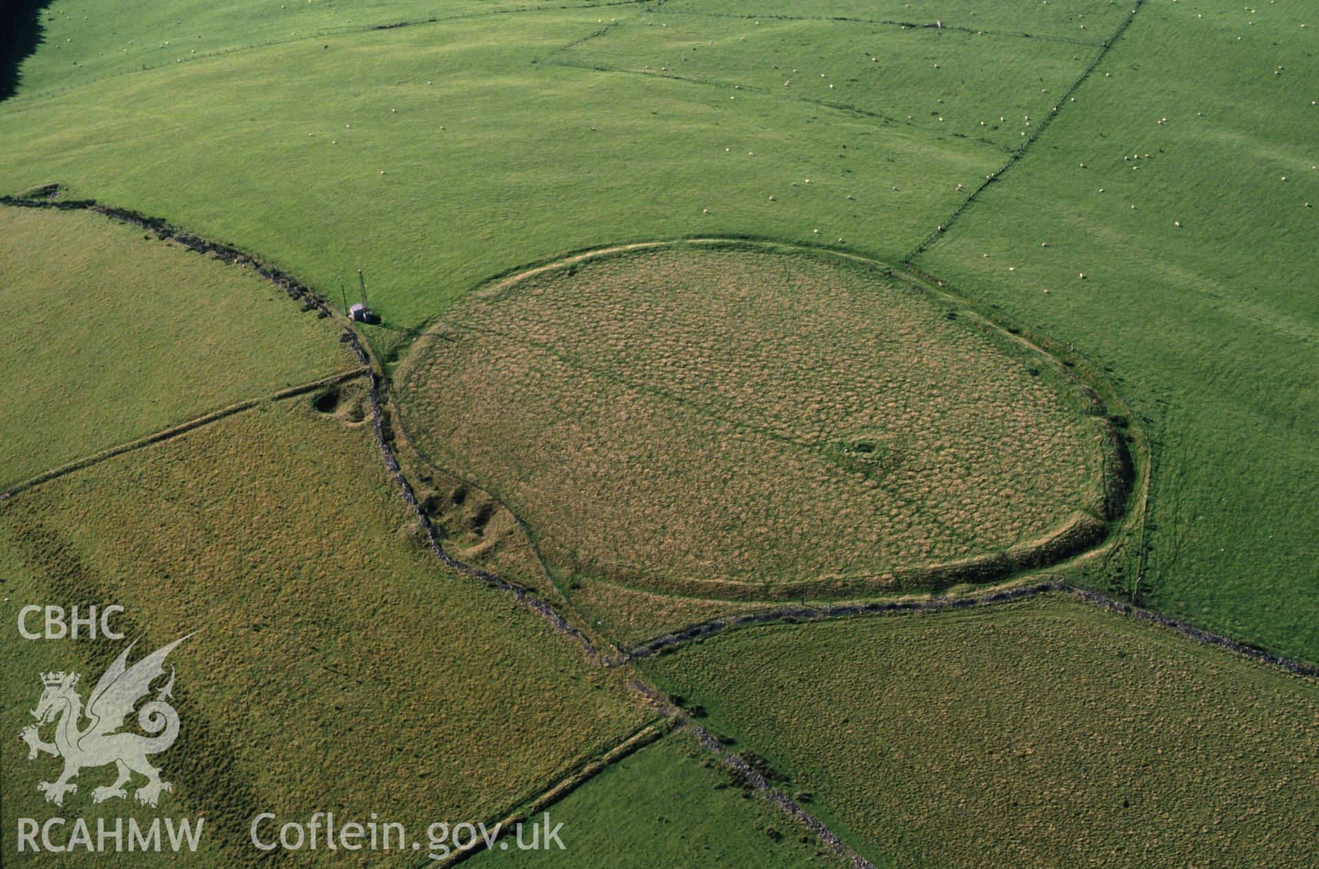 Slide of RCAHMW colour oblique aerial photograph of Buarth Y Gaer;mynydd Y Gaer, taken by C.R. Musson, 25/8/1991.