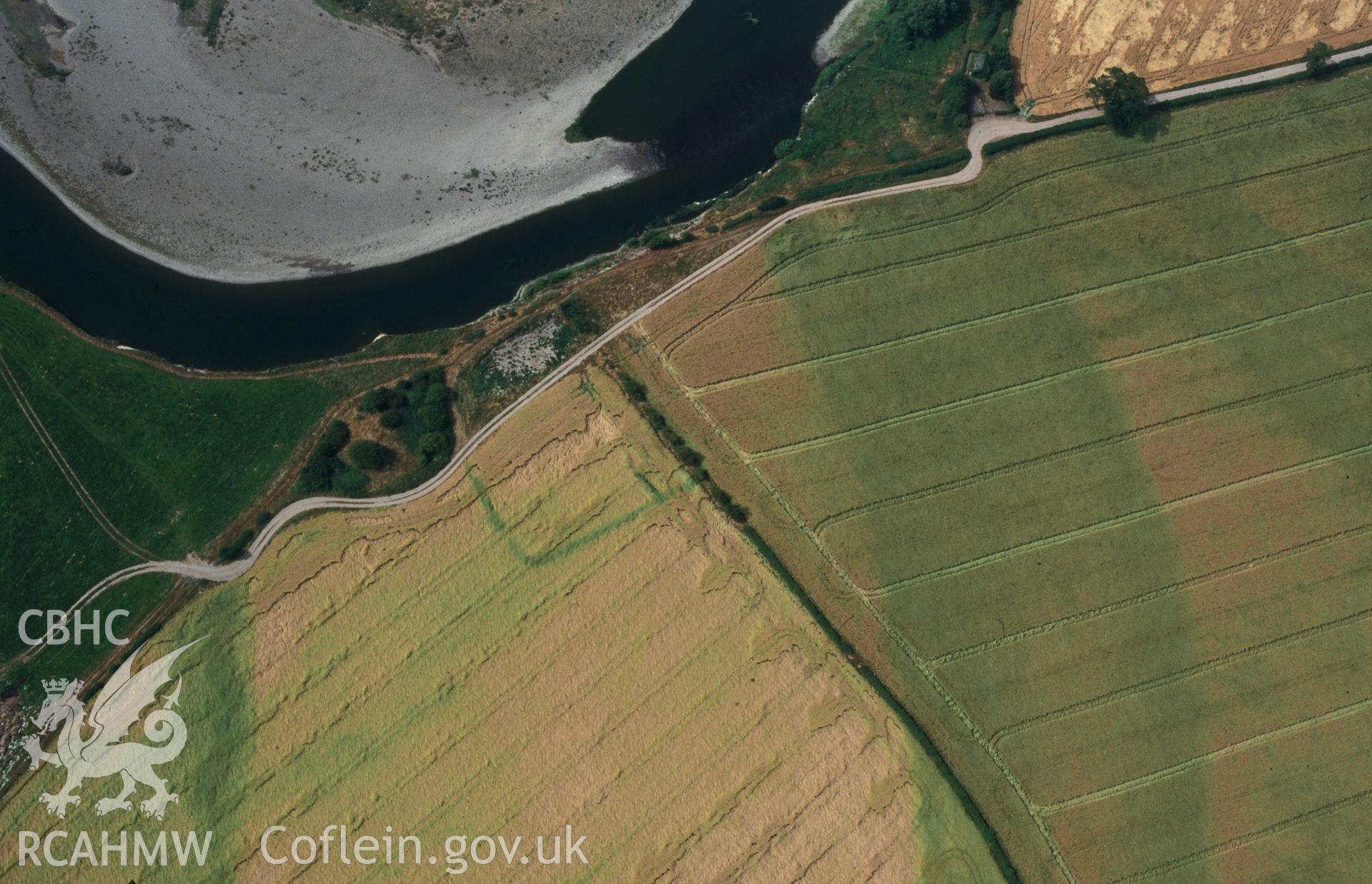 Slide of RCAHMW colour oblique aerial photograph of Llowes Cropmark, taken by C.R. Musson, 22/7/1996.