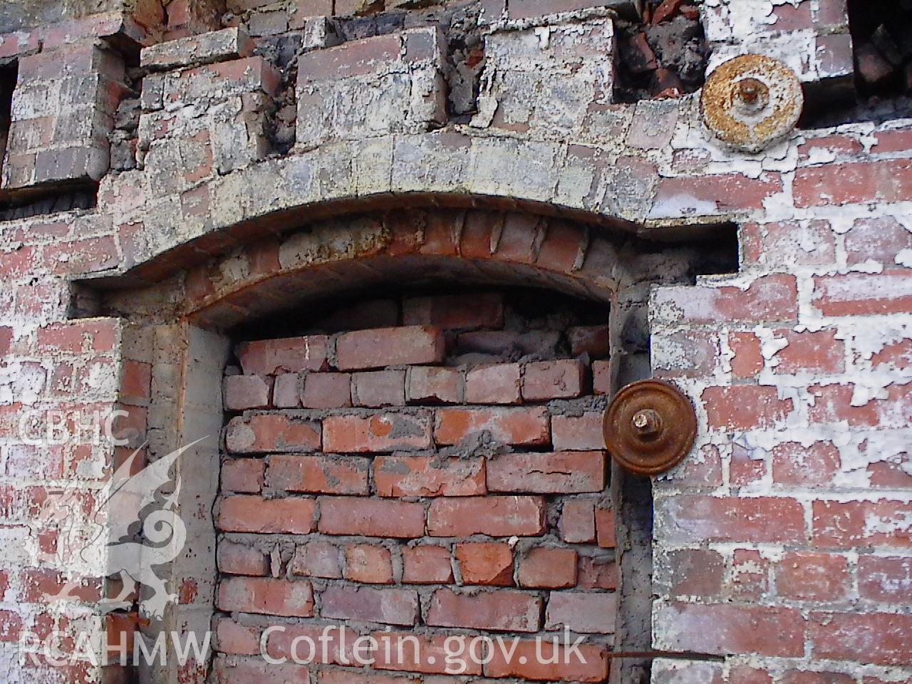 Colour digital photograph showing a brick wall at the Malt House, East Dock Road, Newport. The photograph was taken after the Malt House was severely damaged by fire.