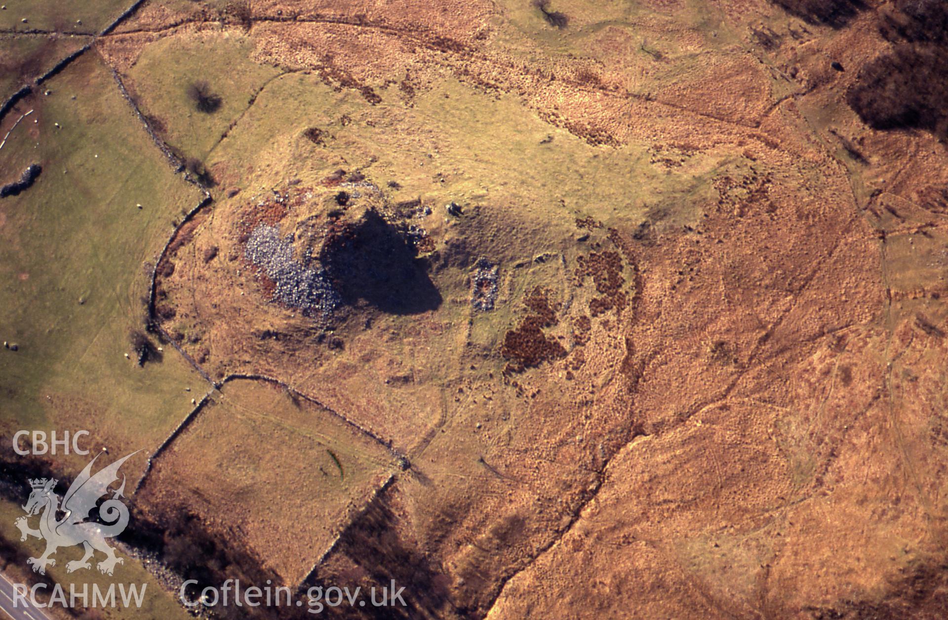 RCAHMW colour slide oblique aerial photograph of Castell Prysor, Trawsfynydd, taken by C.R.Musson on the 30/03/1996